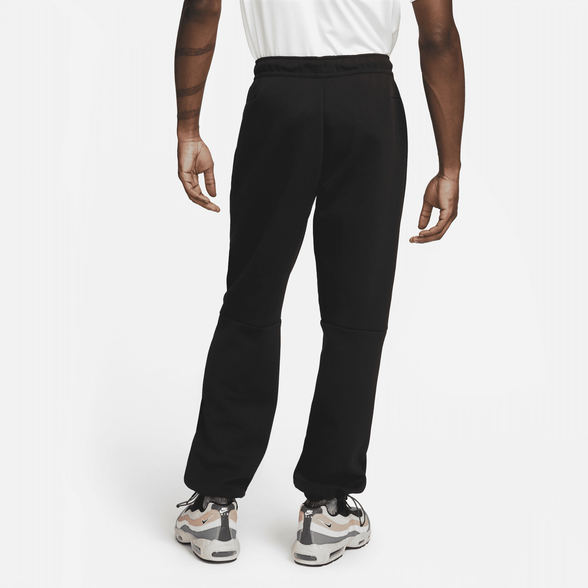 Nike tech fleece pants iconic best sale