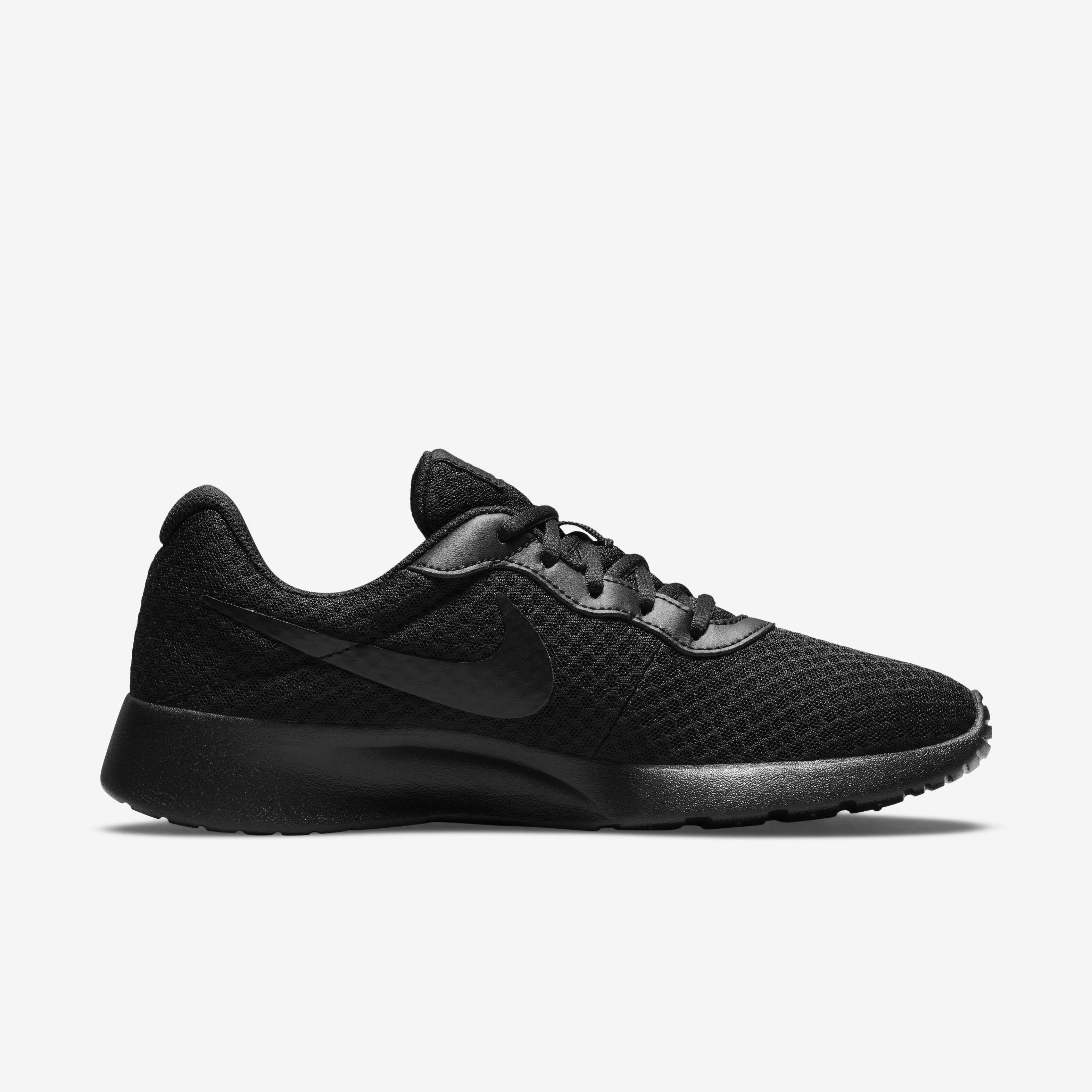 black and rose gold nike tanjun