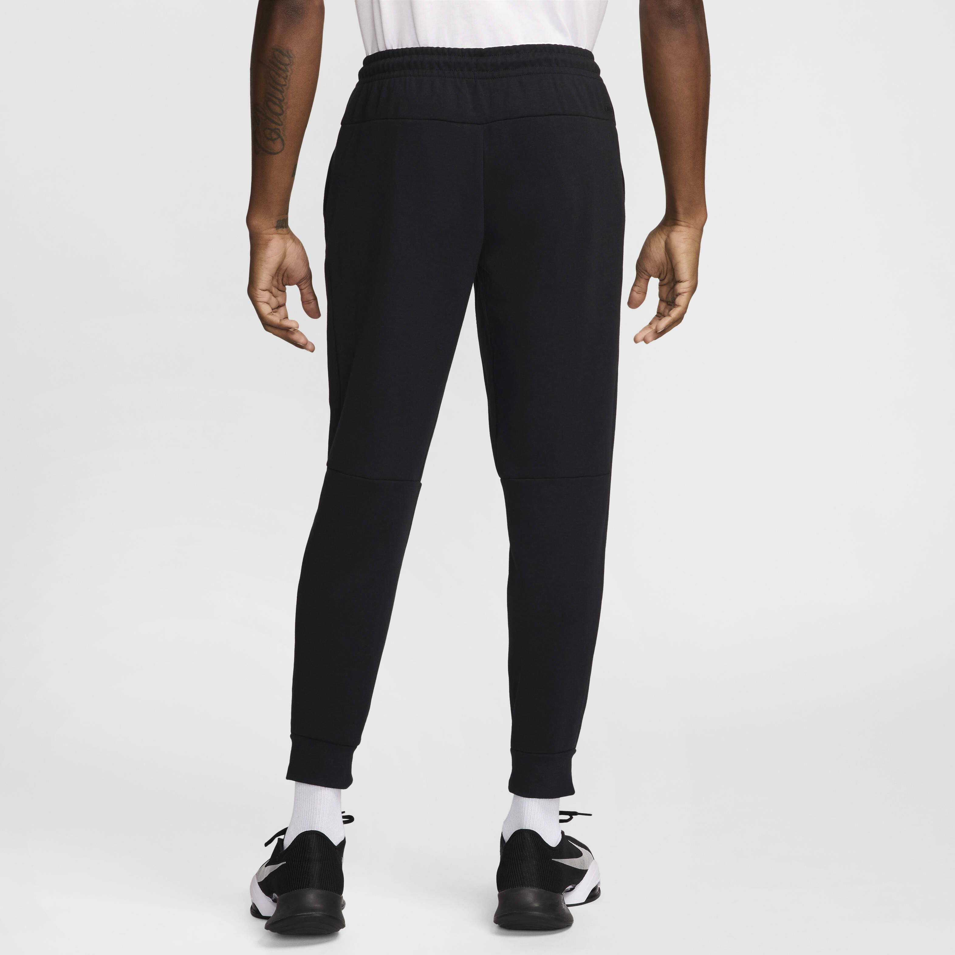 Buy Nike Primary Fleece Men s Dri FIT UV Performance Joggers Black Black Nike Saudi Official