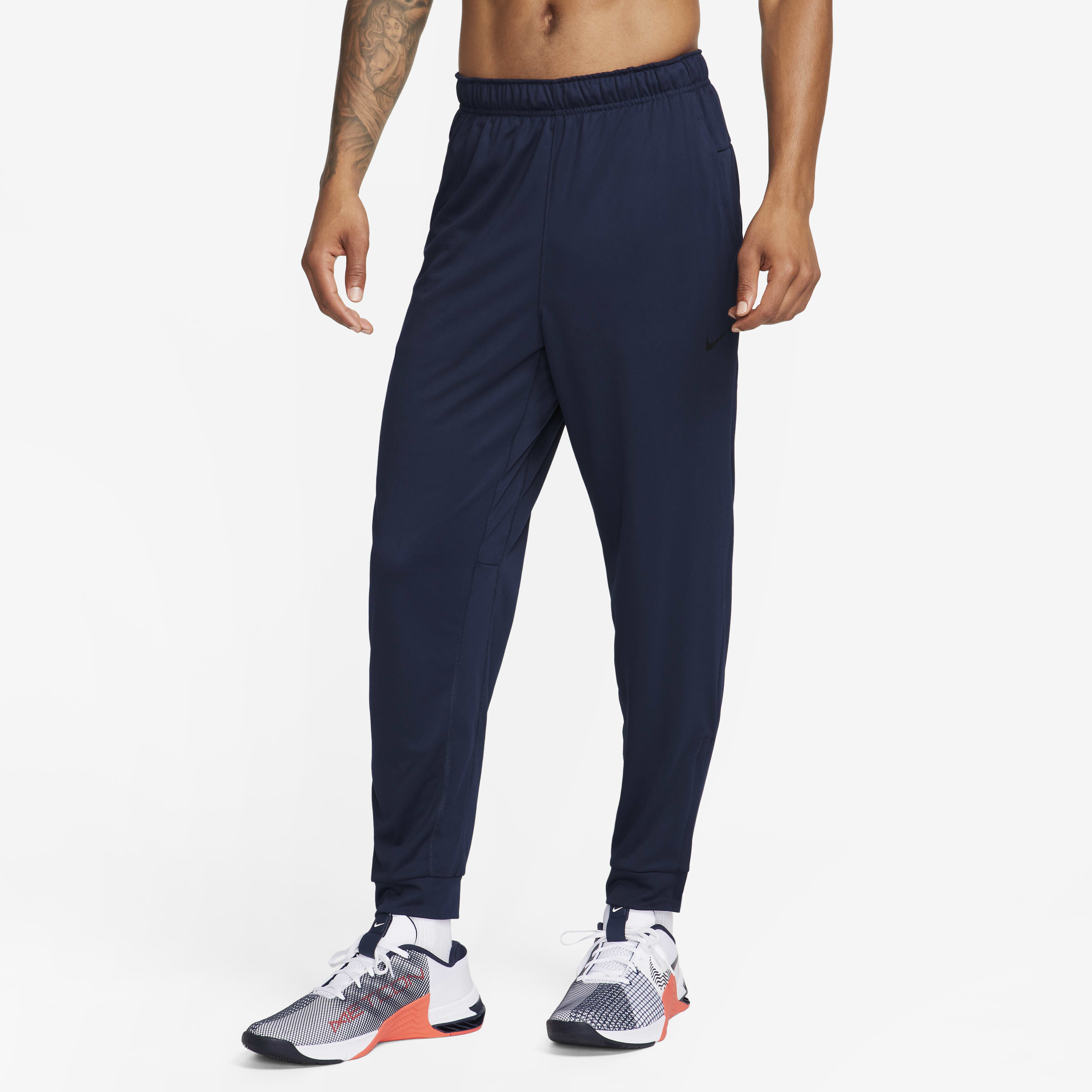Buy Nike Totality Men s Dri FIT Tapered Versatile Trousers Nike Saudi Official