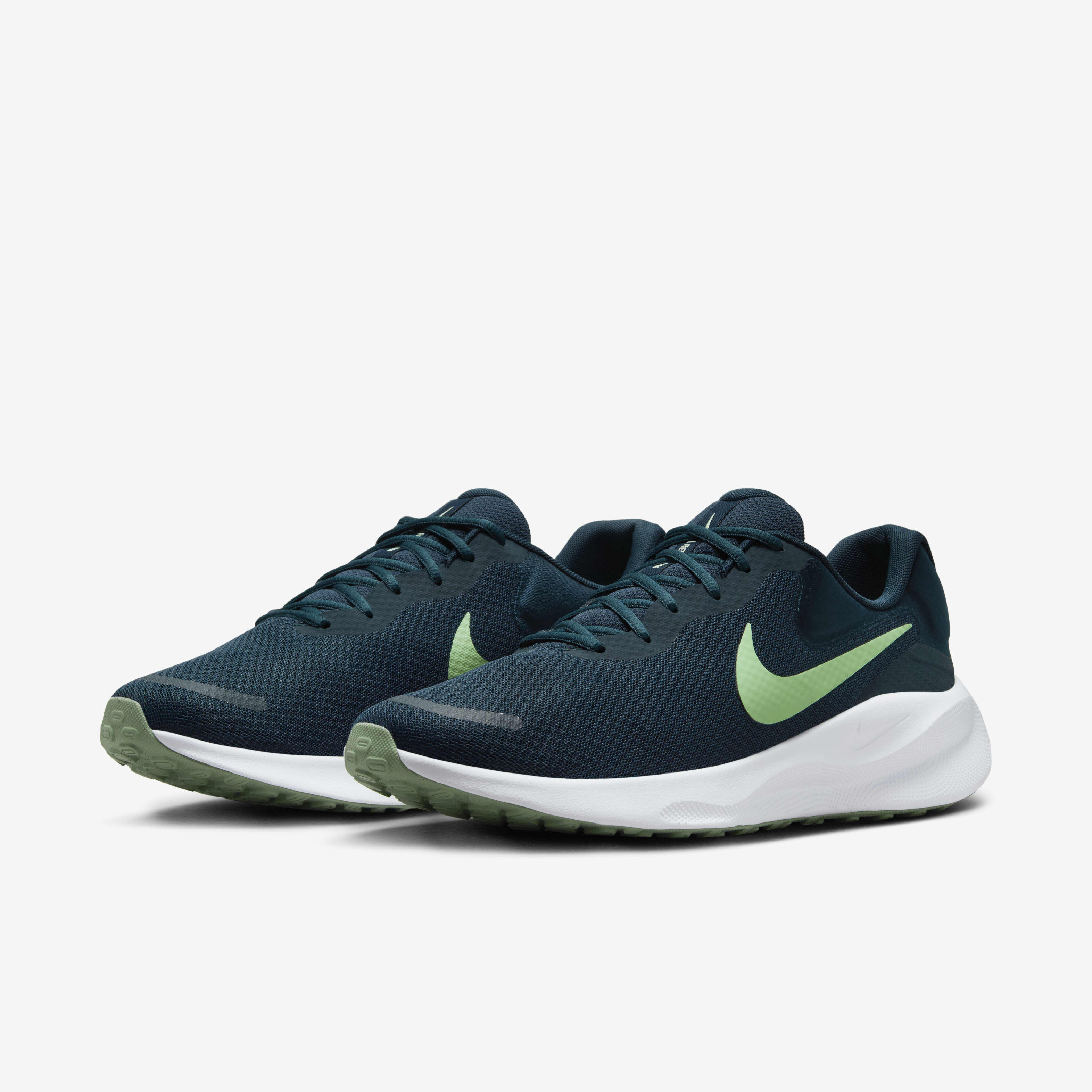 Buy Nike Revolution 7 Men s Road Running Shoes Armoury Navy Photon Dust Jade Horizon Vapour Green Nike Saudi Official