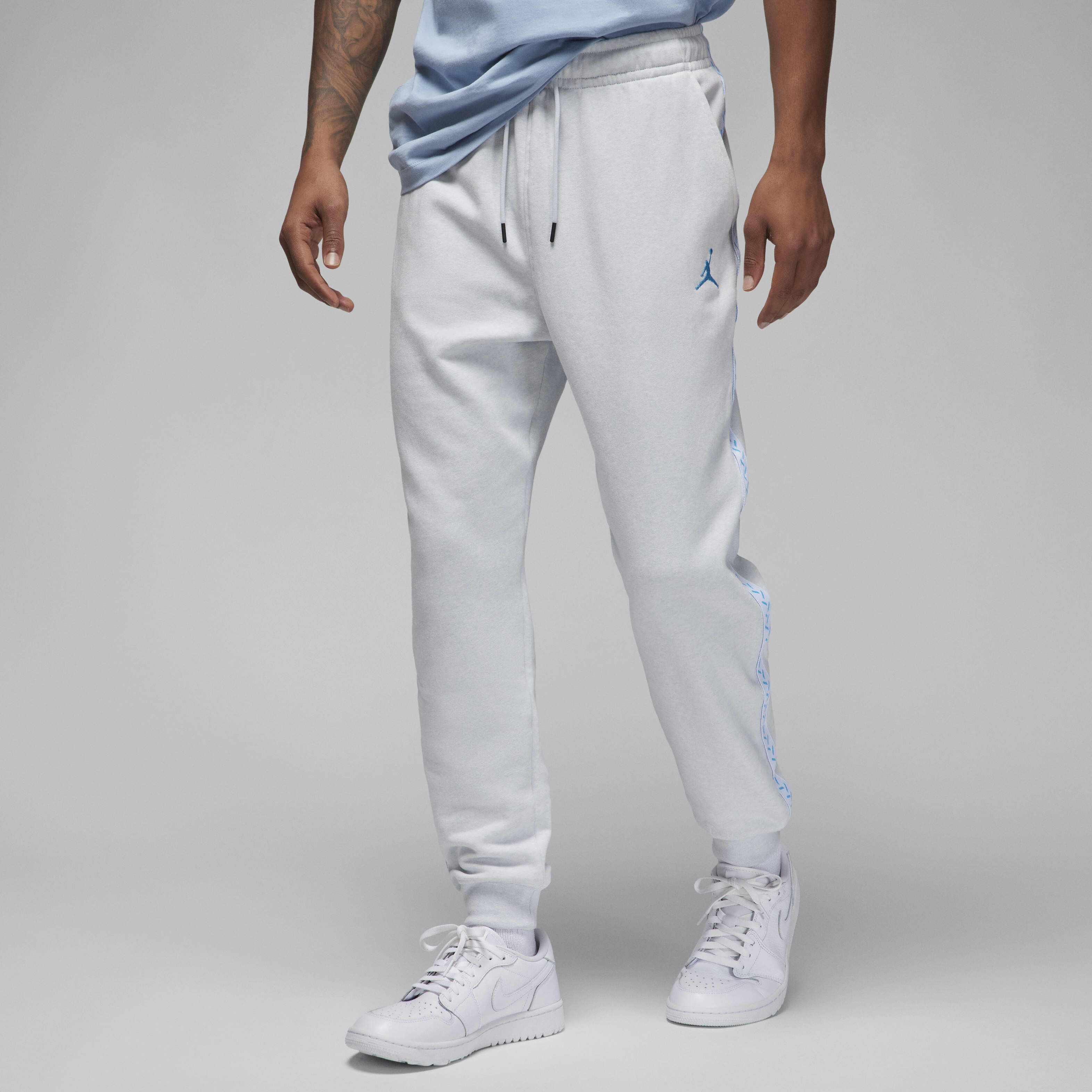 Jordan fleece tape track pants deals