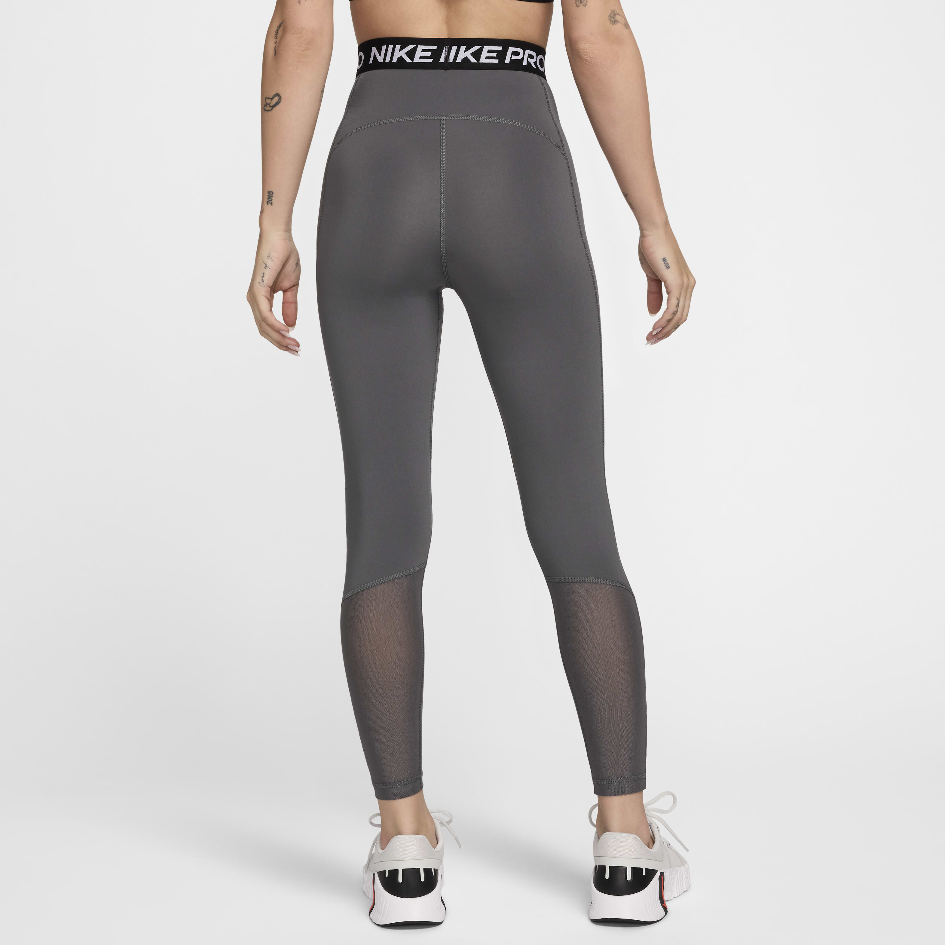 Buy Nike Pro Women s High Waisted 7 8 Mesh Panelled Leggings Iron Grey White Nike Saudi Official