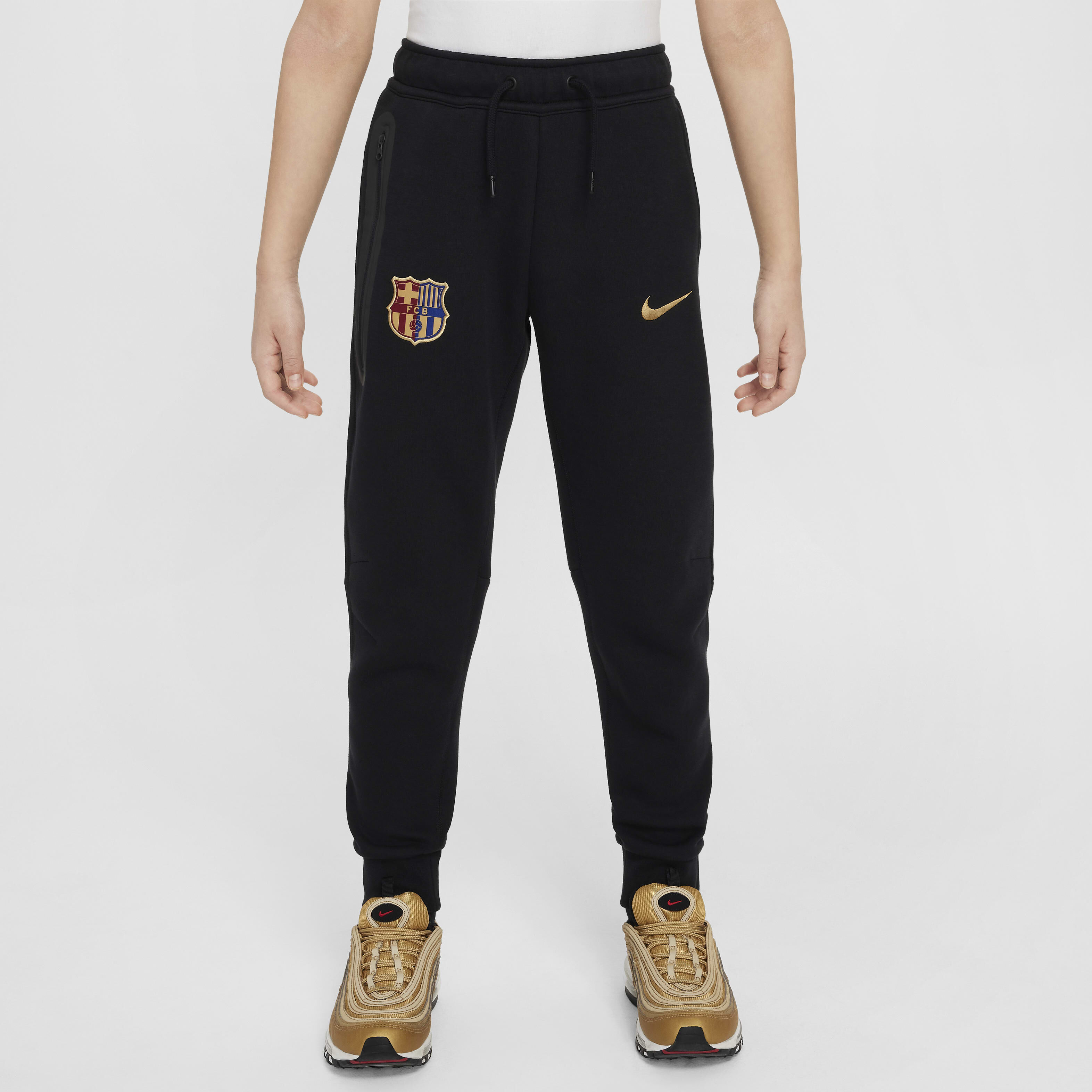 Nike tech fleece pants black junior best sale