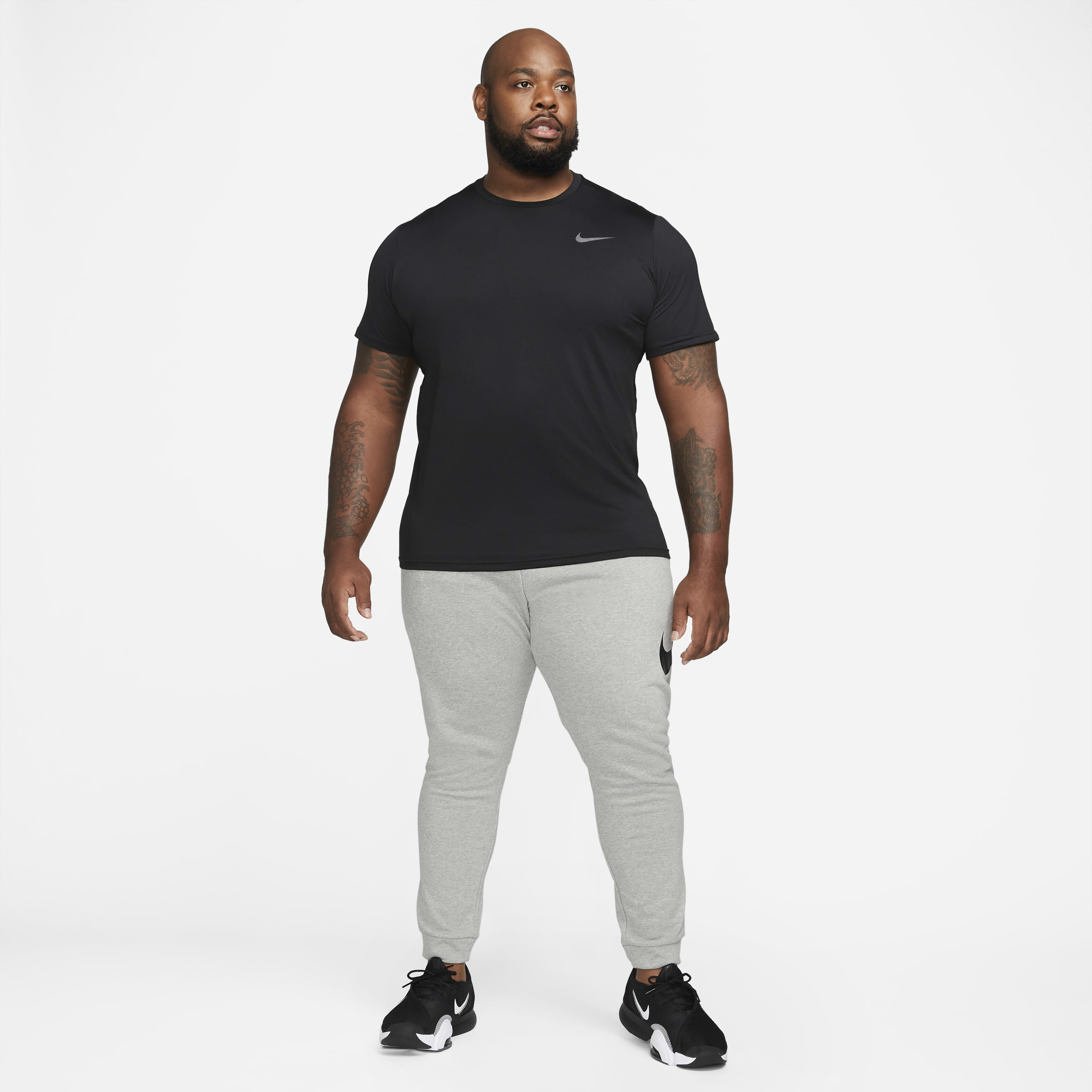 Buy Nike Dry Graphic Men s Dri FIT Taper Fitness Trousers Nike Saudi Official