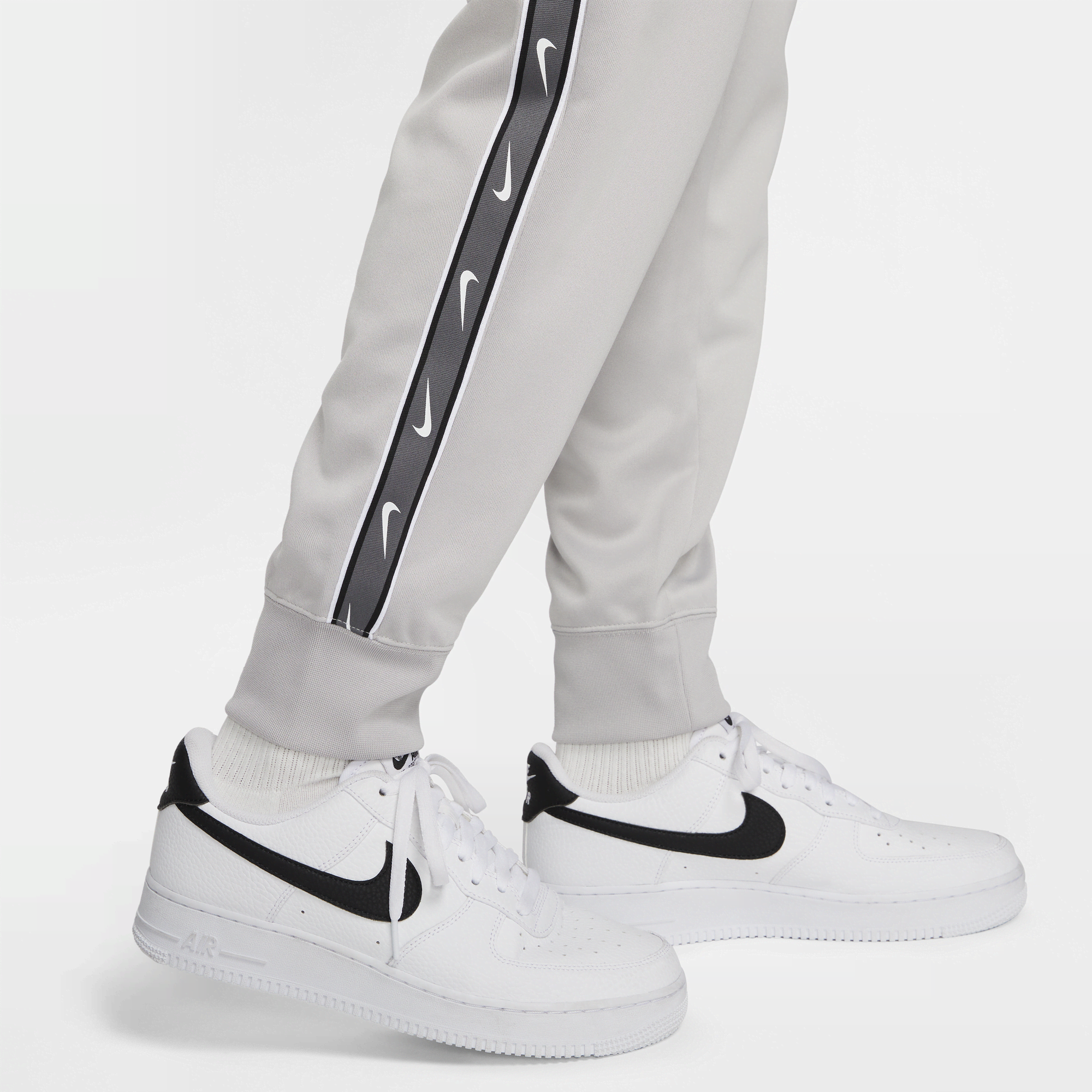 Nike swoosh store taped joggers