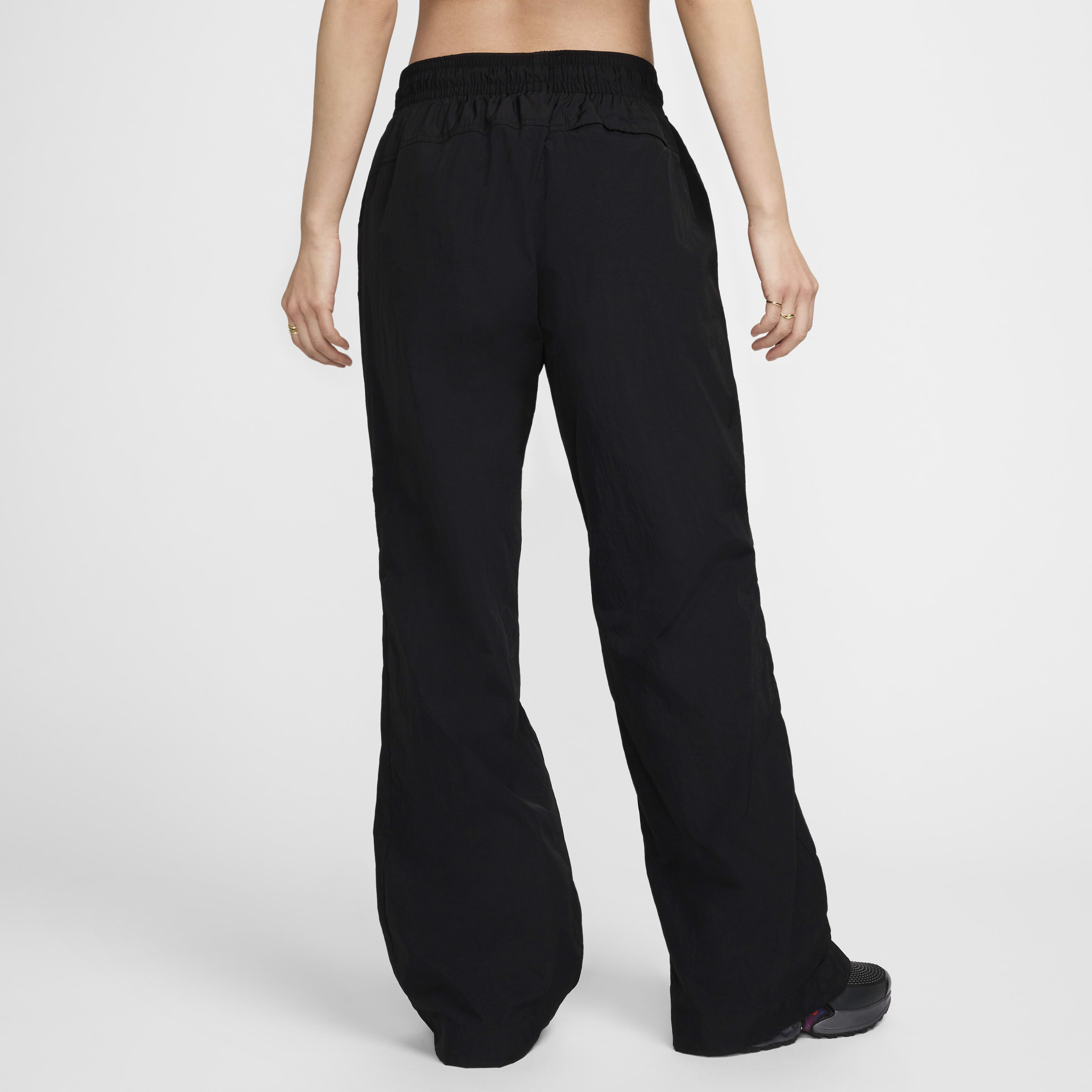 Buy Nike Sportswear Collection Women s Mid Rise Repel Zip Trousers Nike Saudi Official