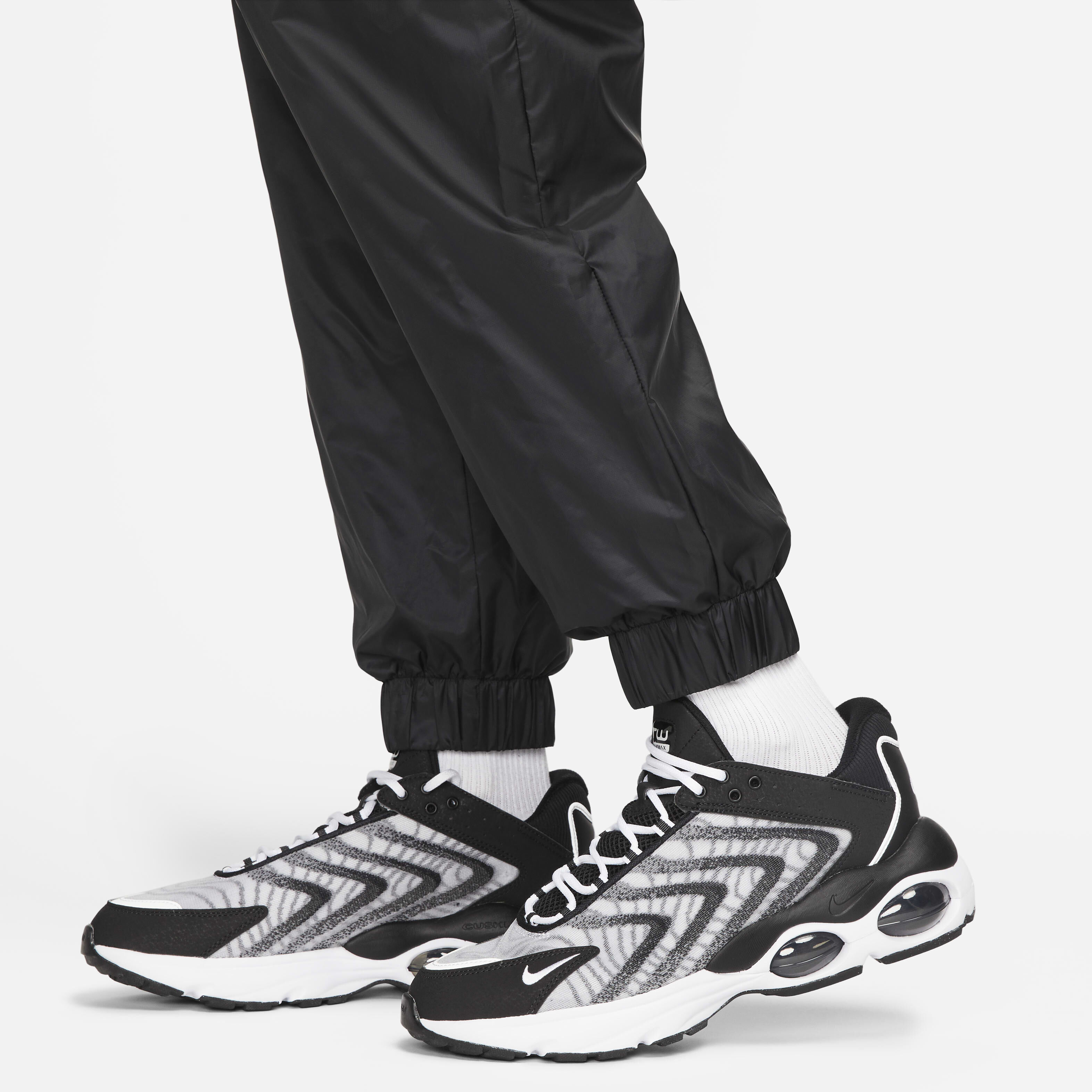 Buy Nike Tech Men's Lined Woven Trousers - Black/Black | Nike Saudi Official