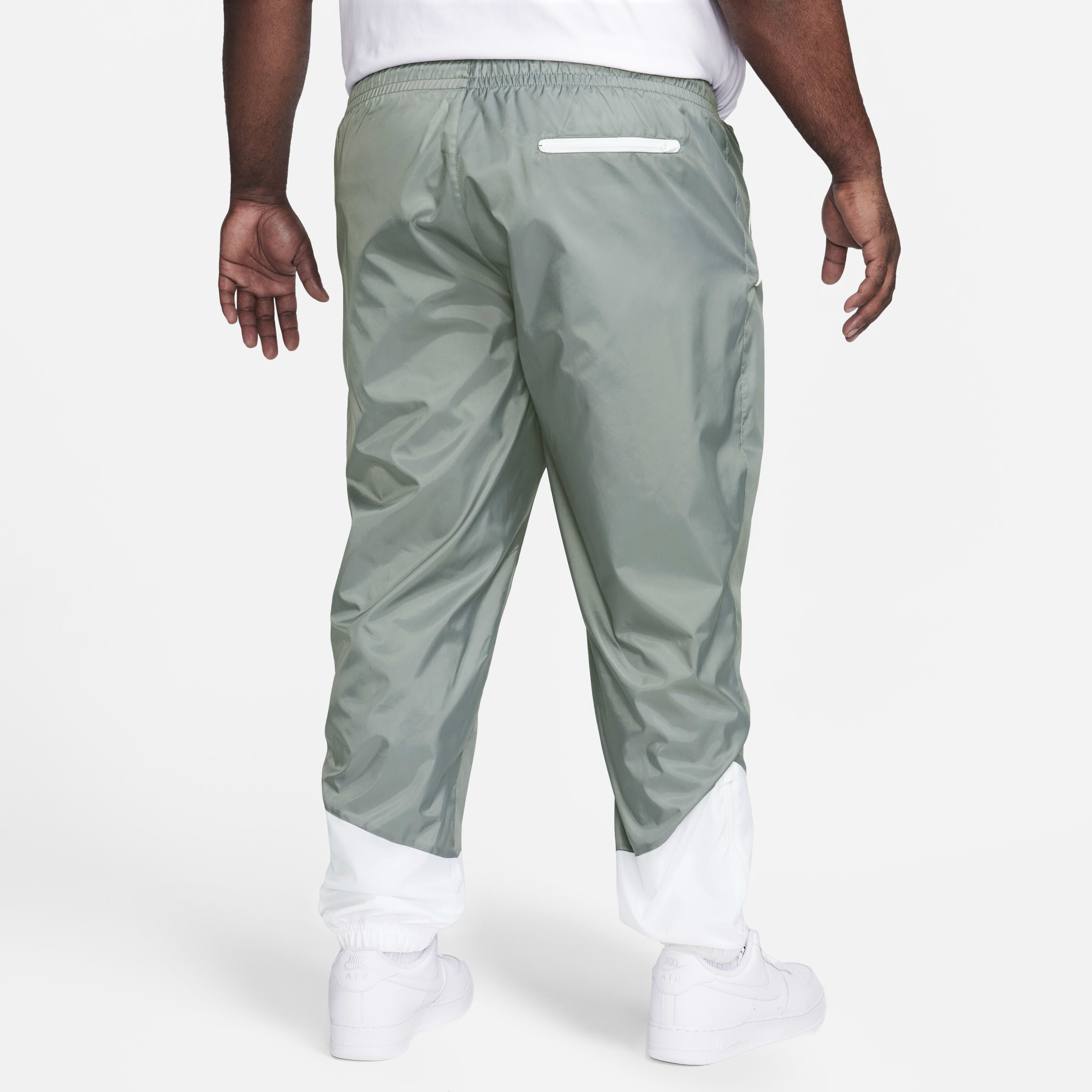 Buy Nike Windrunner Men s Woven Lined Trousers Smoke Grey White Black Nike Saudi Official