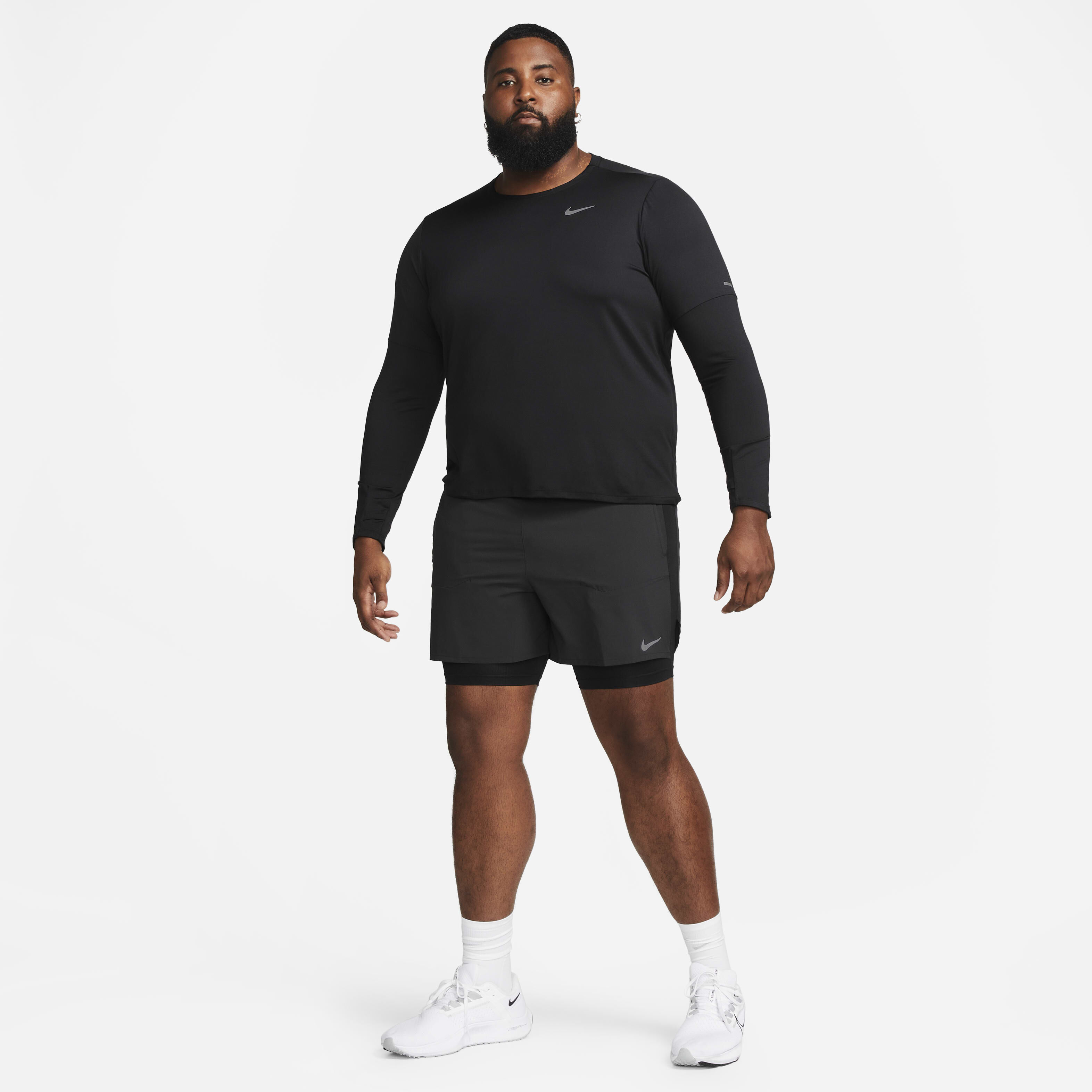 Buy Nike Stride Men s Dri FIT 13cm approx. Hybrid Running Shorts Nike Saudi Official