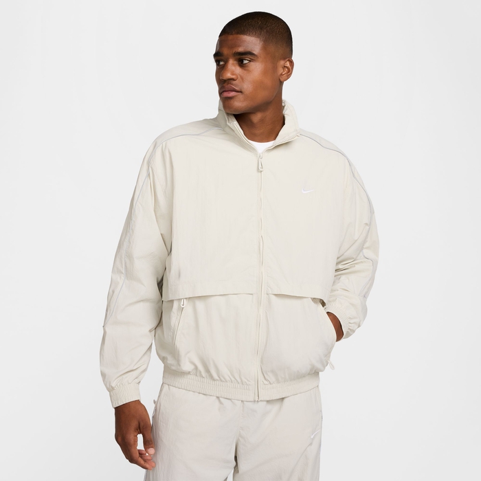 Buy Nike Sportswear Solo Swoosh Men s Woven Tracksuit Jacket Light Bone White Nike Saudi Official