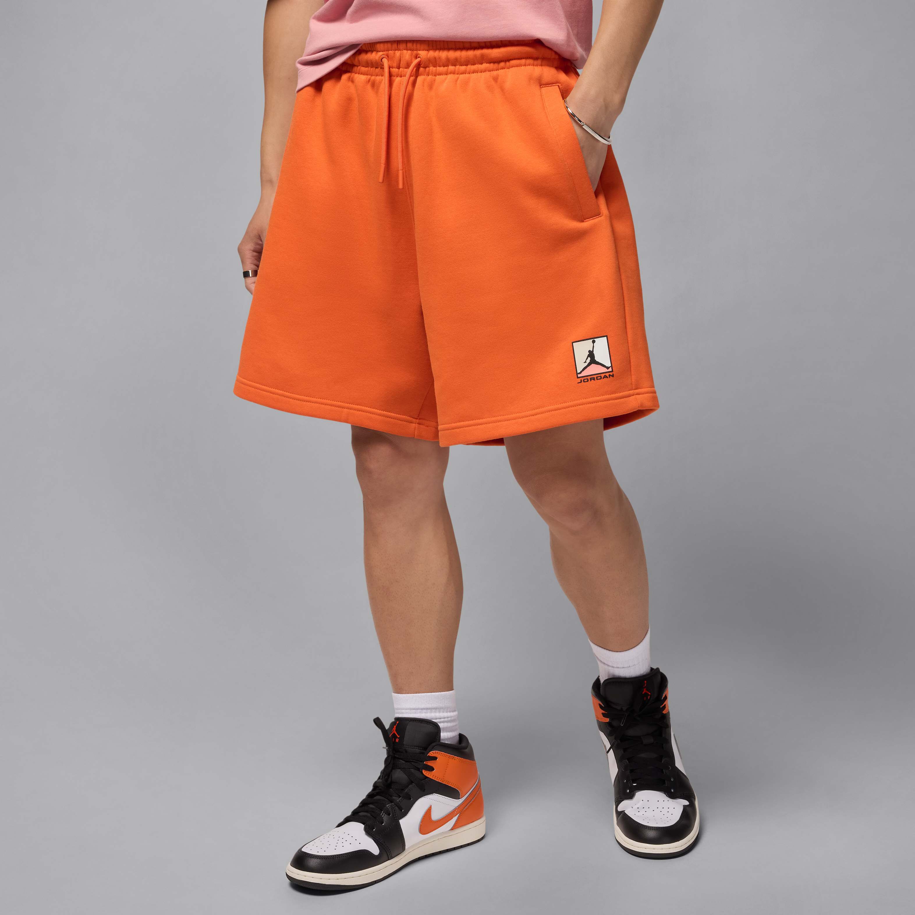Buy Jordan Brooklyn Fleece Men's Graphic Shorts - Starfish/Black