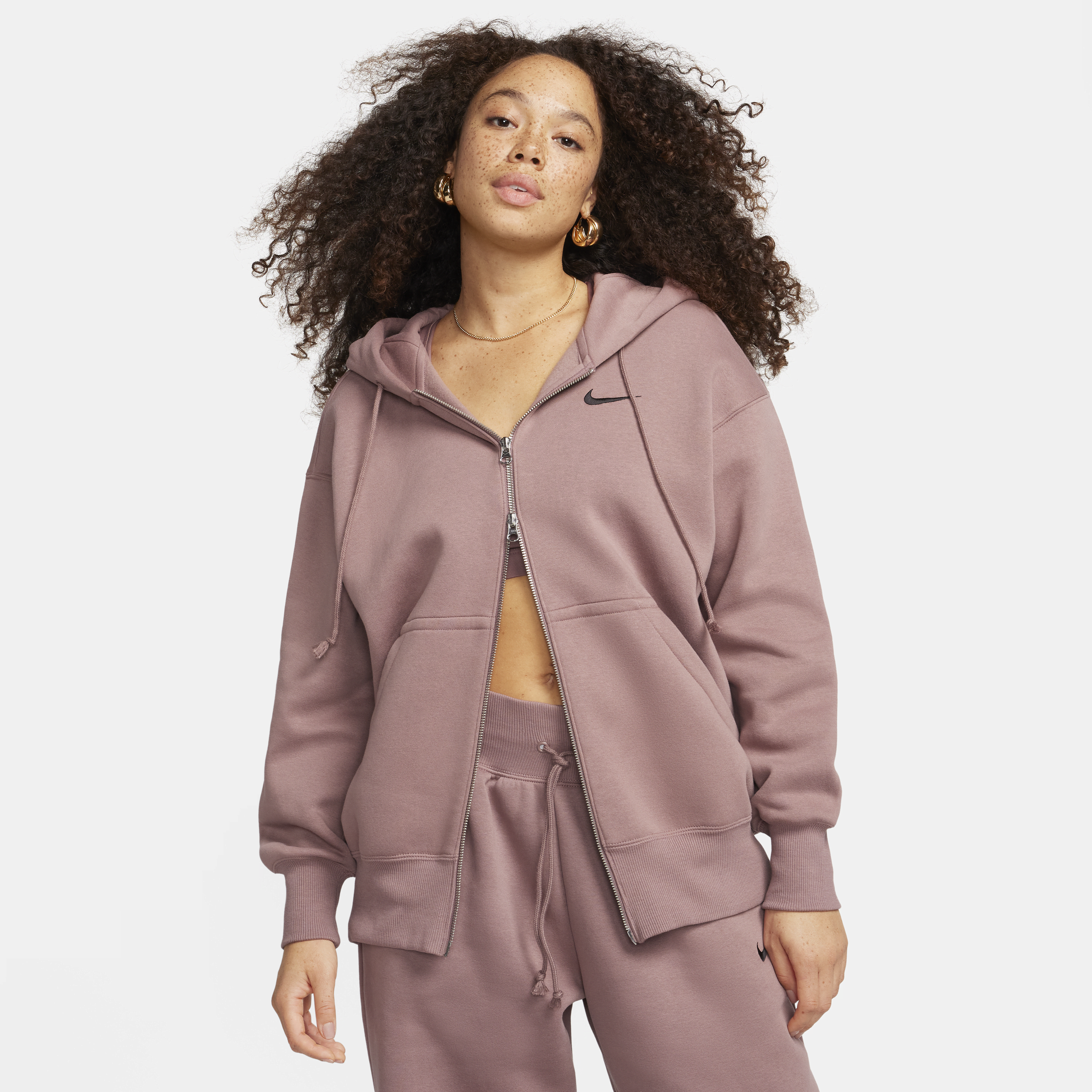 Nike pink zip up hot sale hoodie