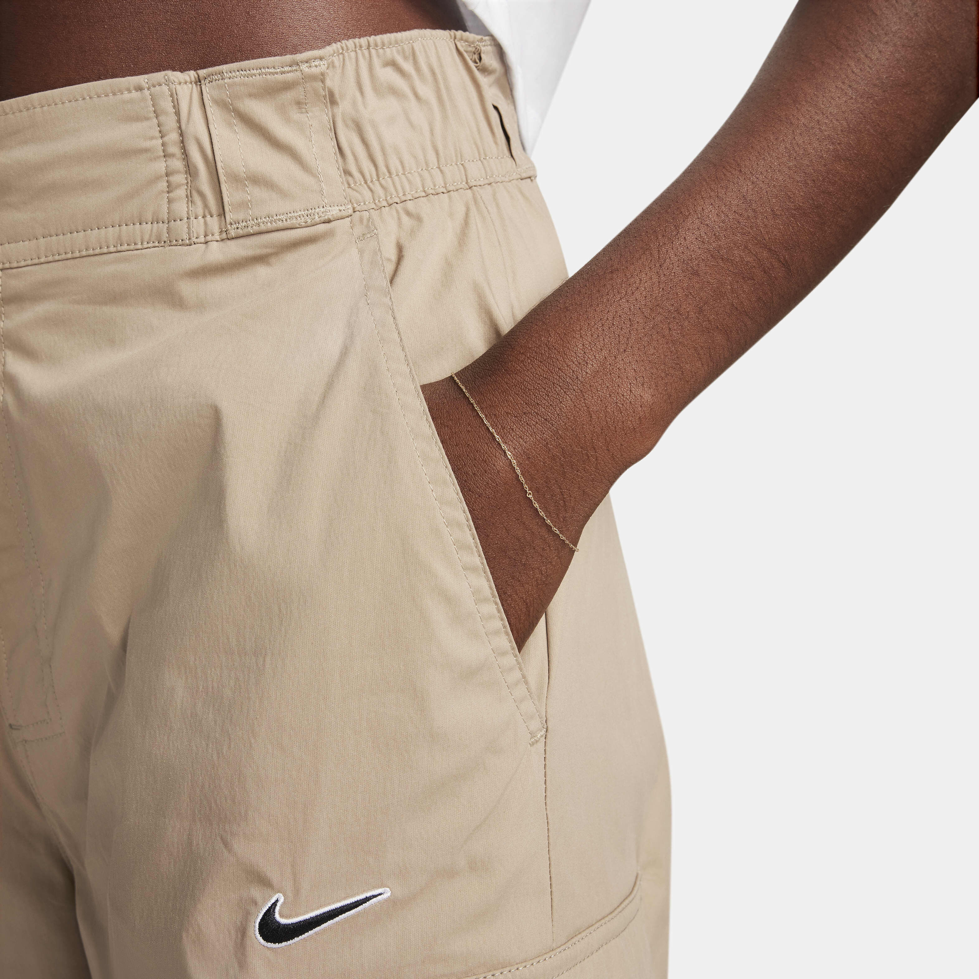 Buy Nike Sportswear Women s High Waisted Loose Woven Cargo Trousers Nike Saudi Official