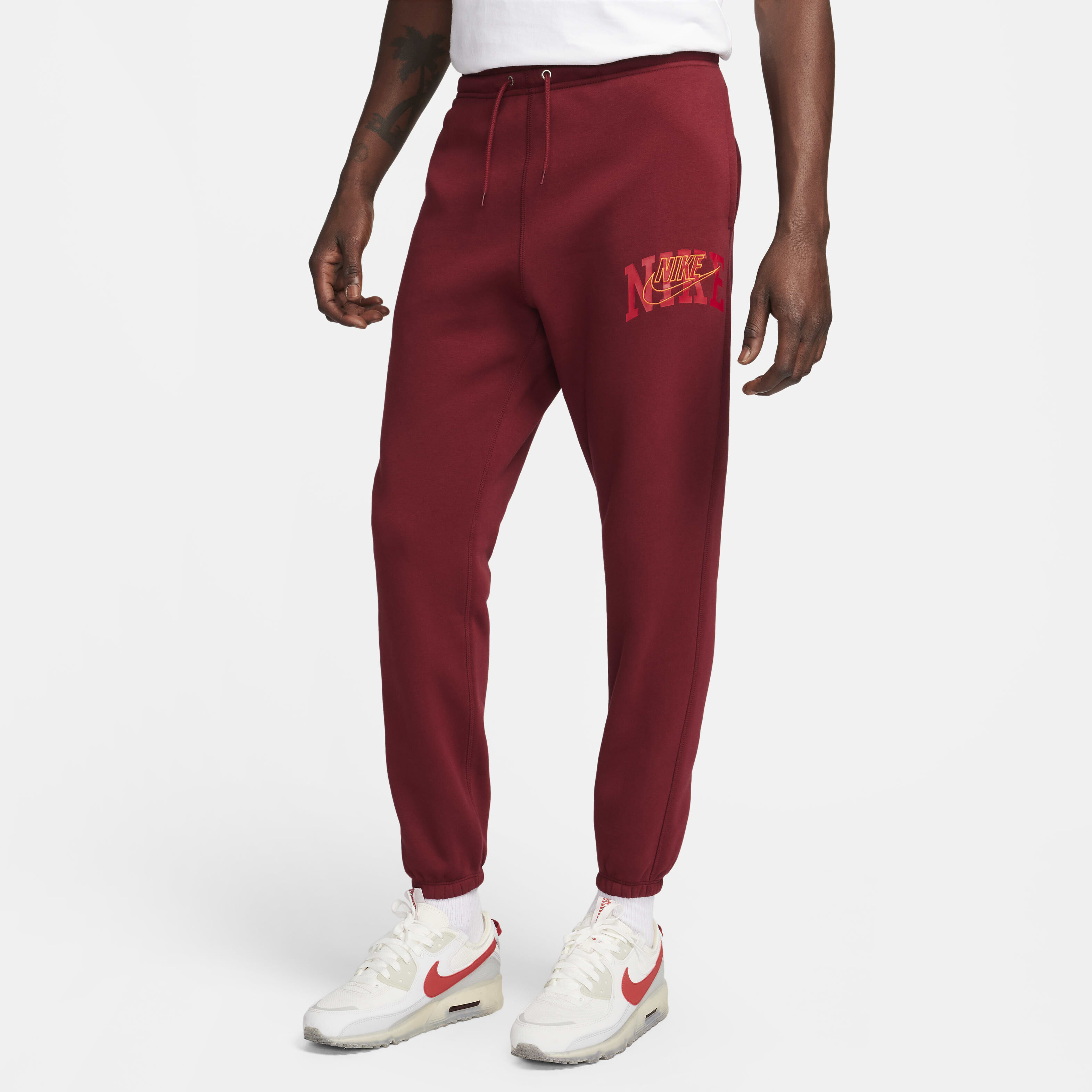 Buy Nike Club Fleece Men s Cuffed Trousers Nike Saudi Official