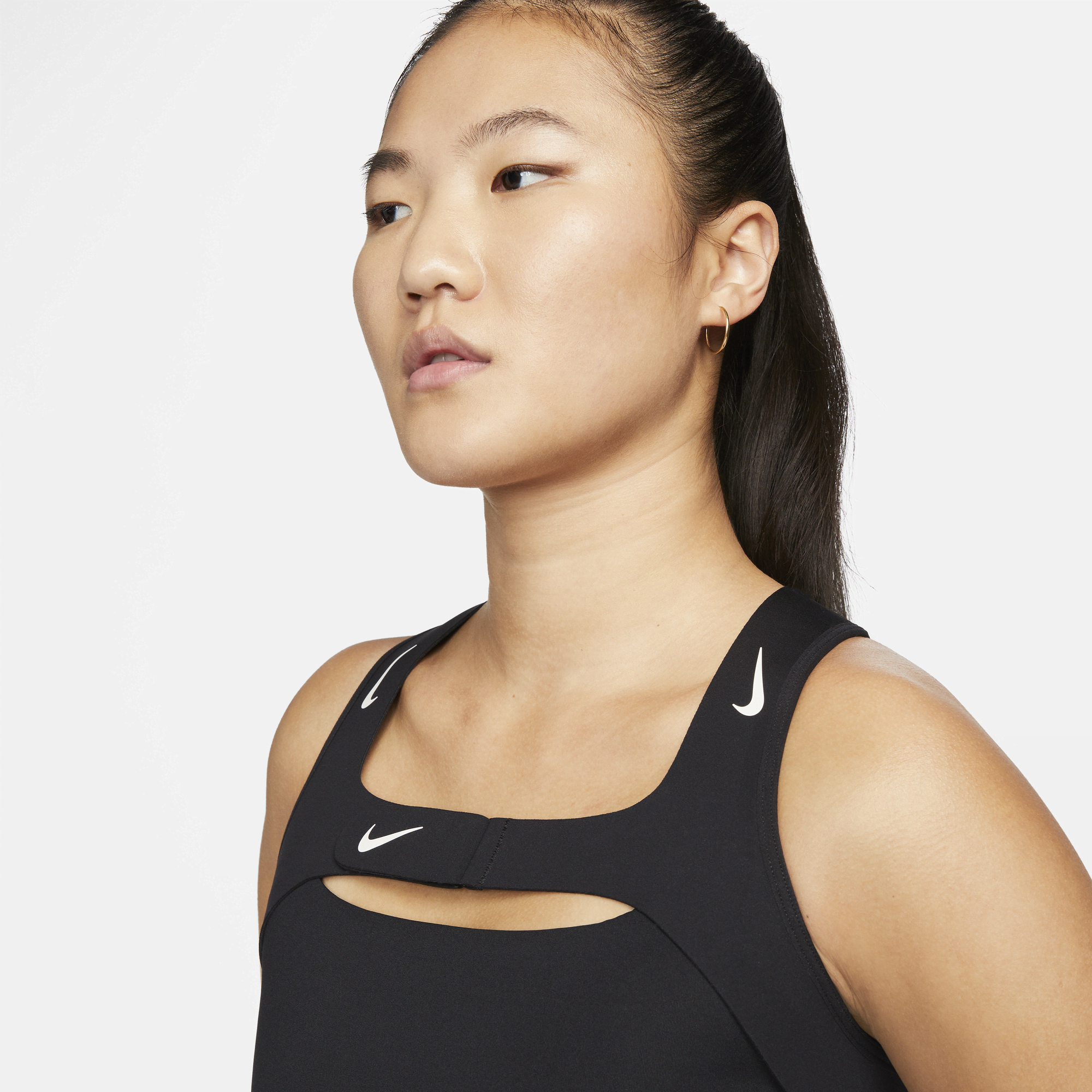 Nike classic swoosh hotsell modern sports bra