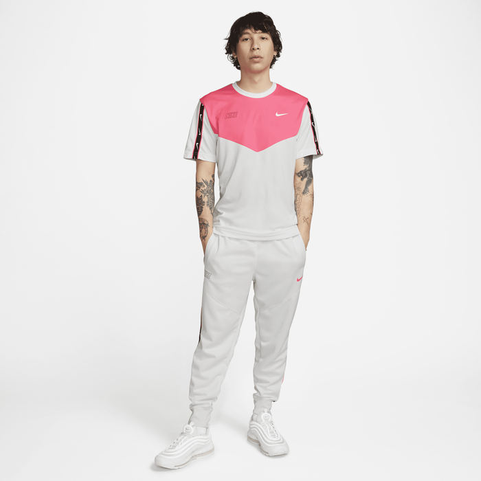 Pink nike jumpsuit sales mens