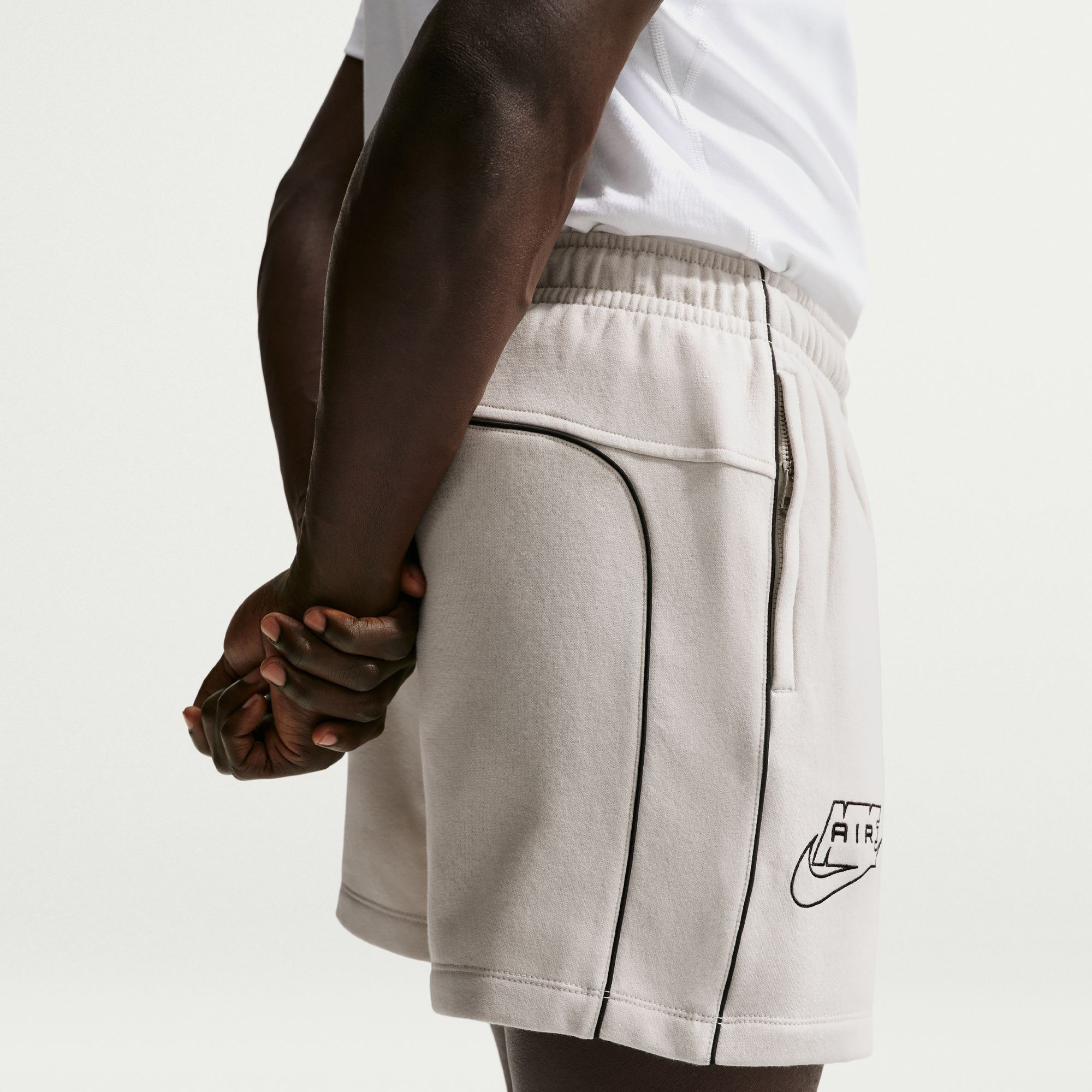 Buy Nike Air Men's Fleece Shorts - Light Bone/Black/Black @ Nike Saudi