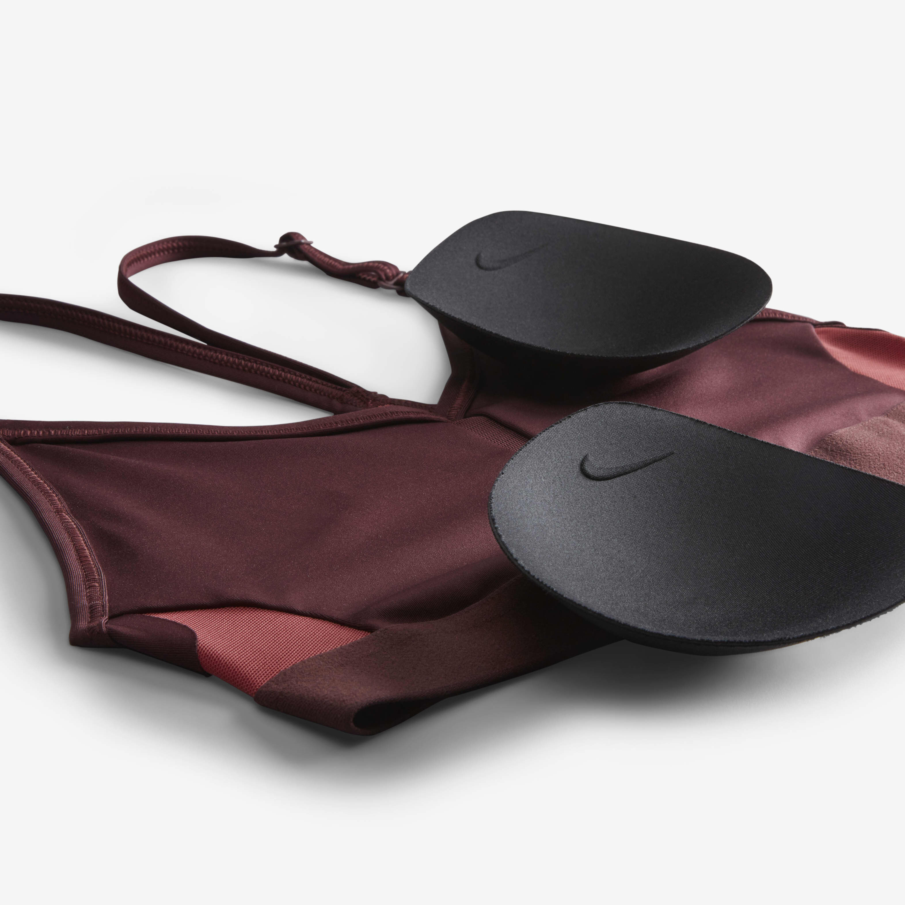 Buy Nike Indy Women s Light Support Padded V Neck Sports Bra Burgundy Crush Cedar Burgundy Crush White Nike Saudi Official