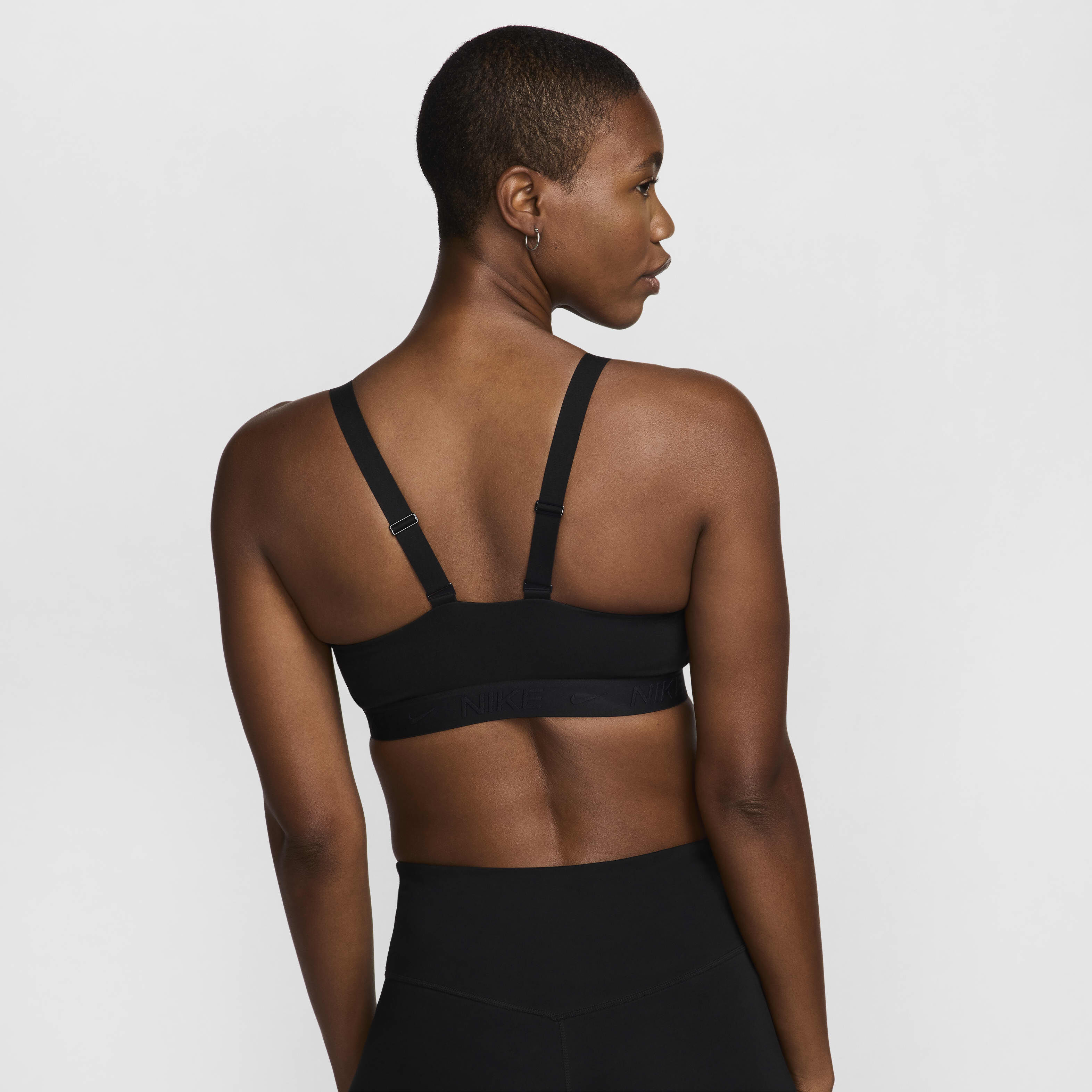 Buy Nike Indy Medium Support Women s Padded Adjustable Sports Bra Black Black Black Nike Saudi Official