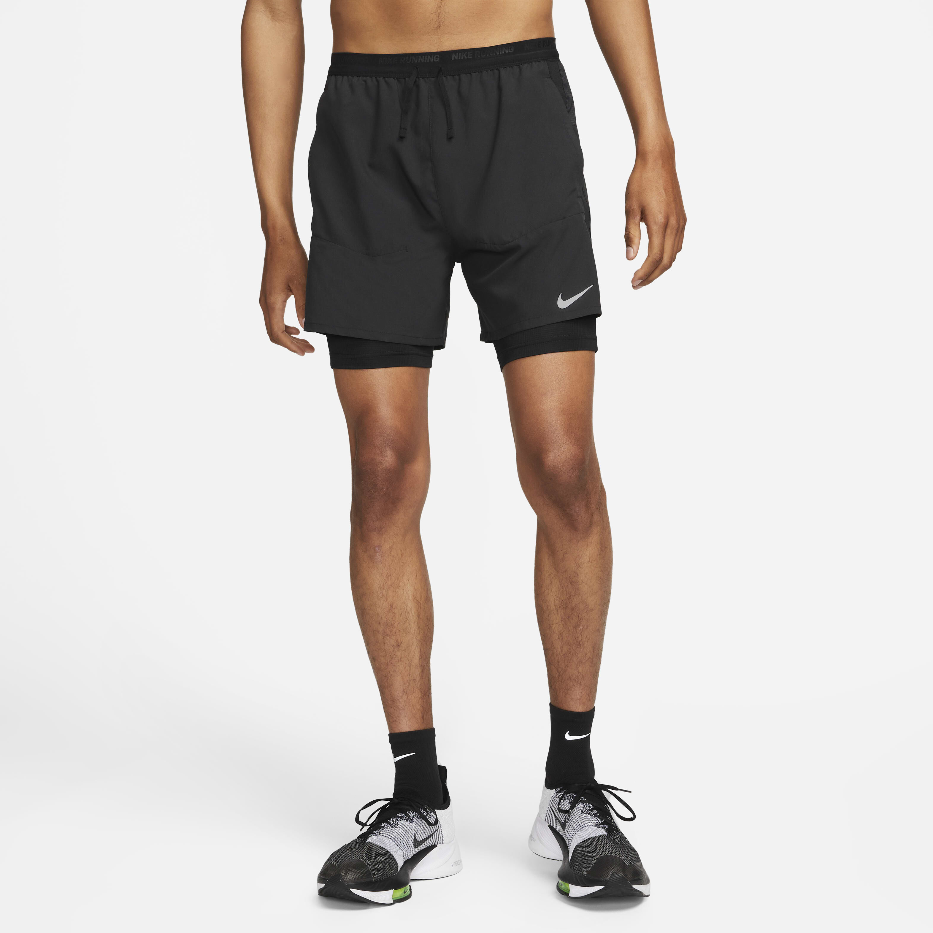 Buy Nike Stride Men s Dri FIT 13cm approx. Hybrid Running Shorts Nike Saudi Official