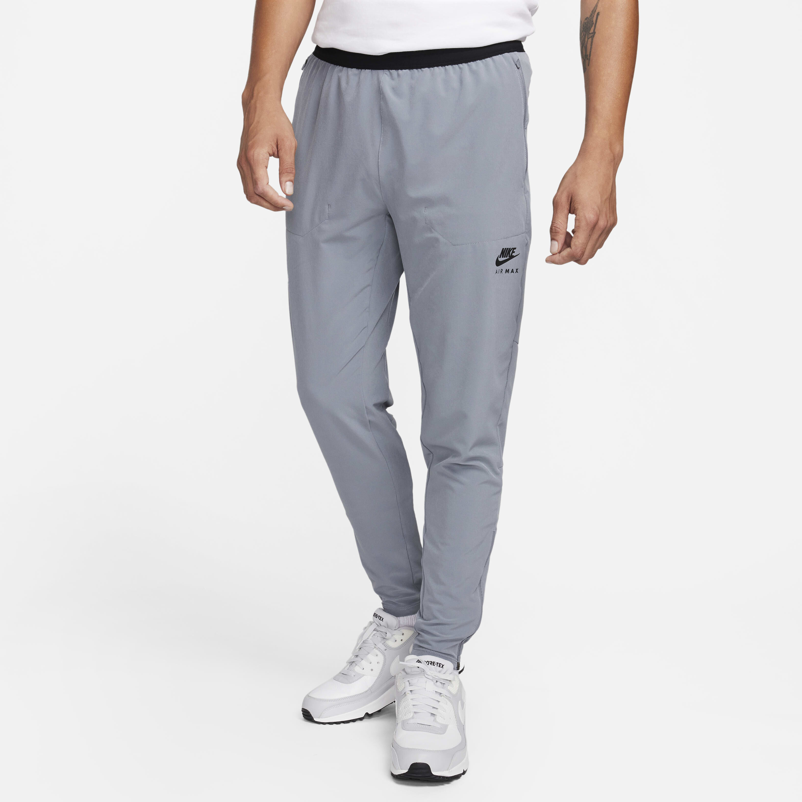Buy Nike Air Max Men s Woven Trousers Cool Grey Black Nike Saudi Official
