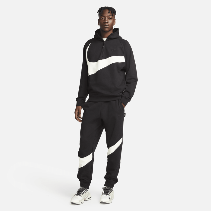 Nike swoosh logo 2024 tracksuit in black