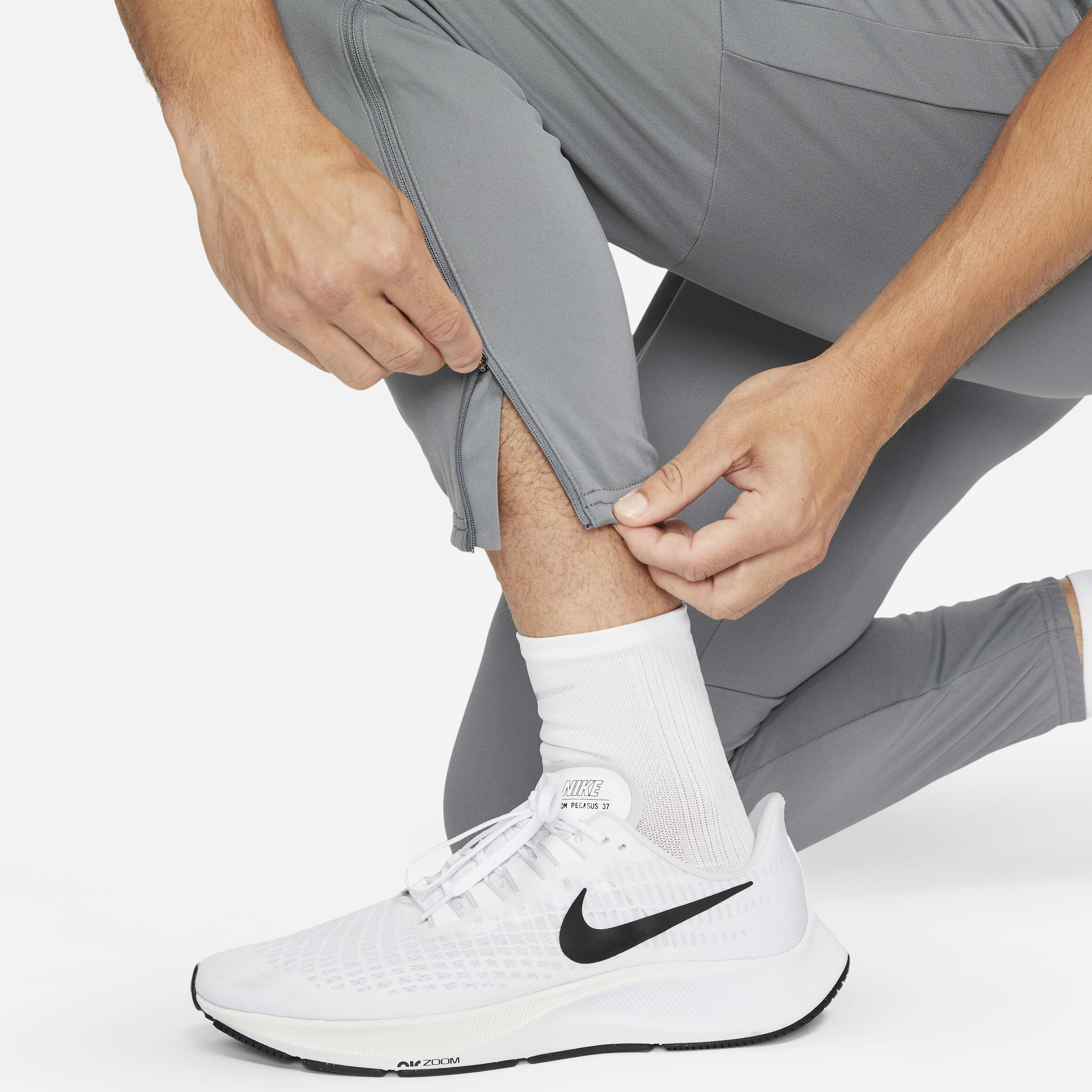 Buy Nike Dri FIT Challenger Men s Knit Running Trousers Nike Saudi Official