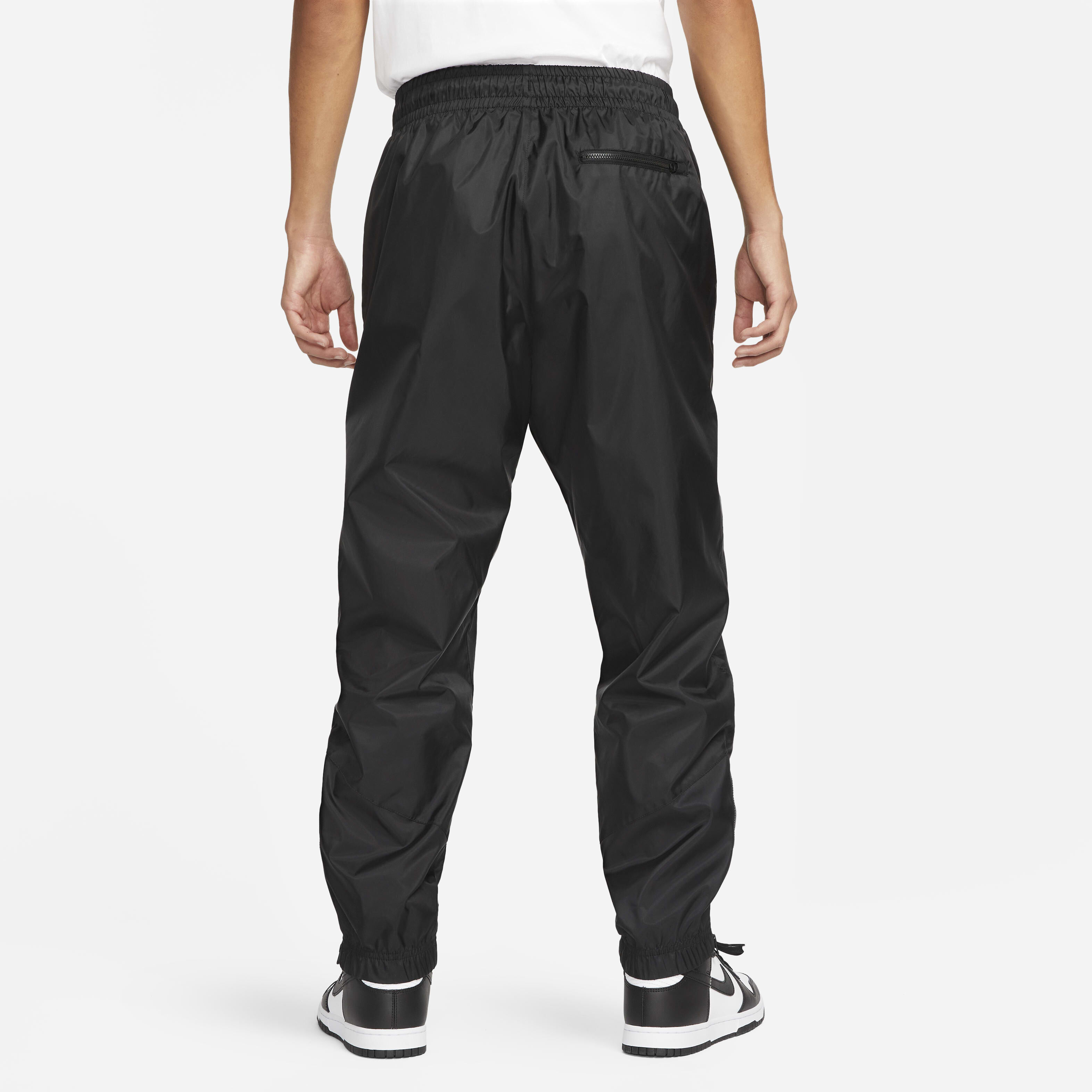Nike windbreaker mens pants on sale