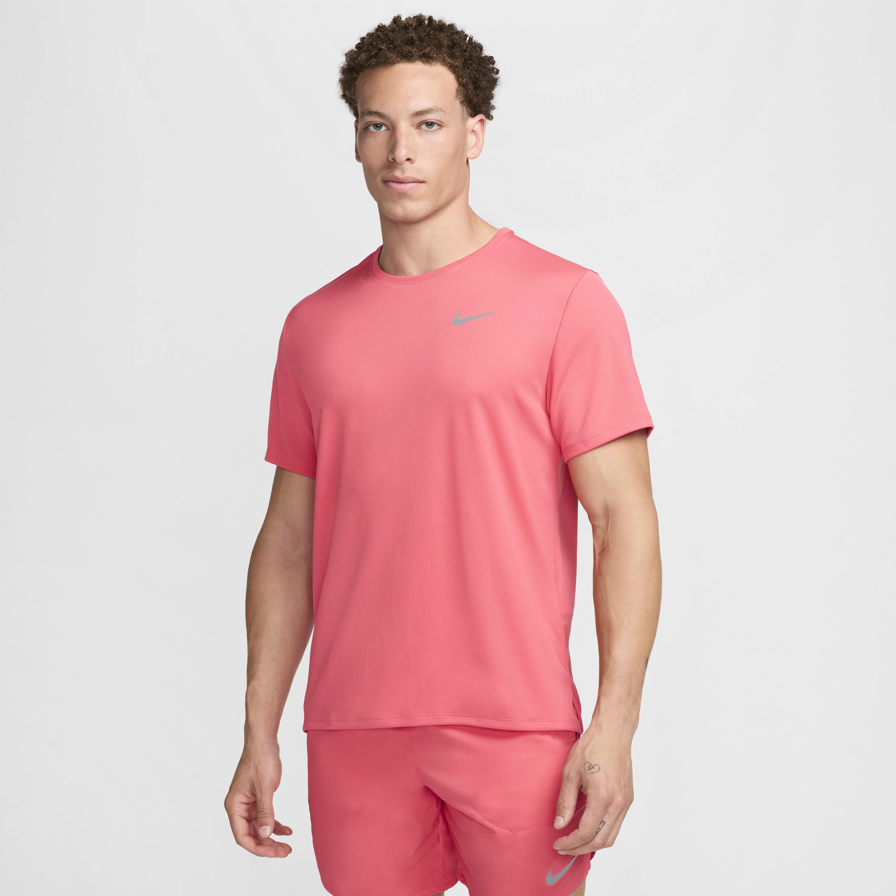 nike miler pink mens