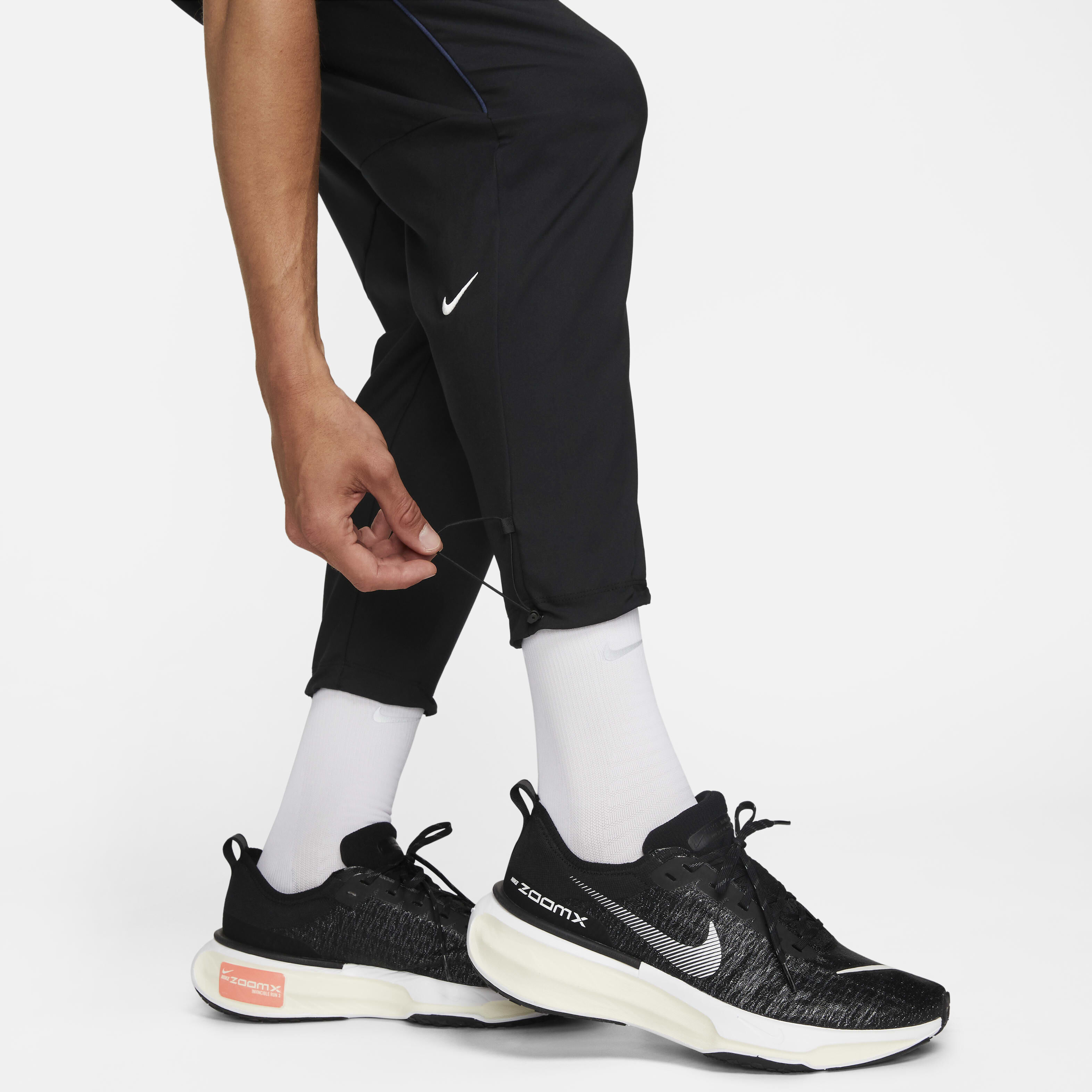 Buy Nike Challenger Track Club Men s Dri FIT Running Trousers Nike Saudi Official