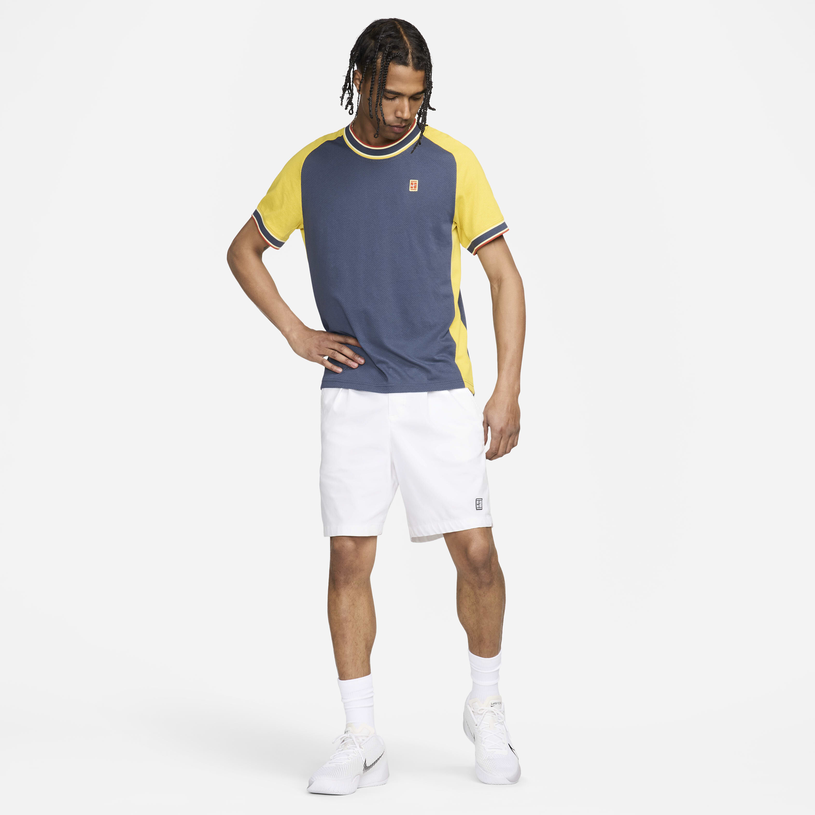 Buy NikeCourt Heritage Men s Short Sleeve Tennis Top Nike Saudi Official
