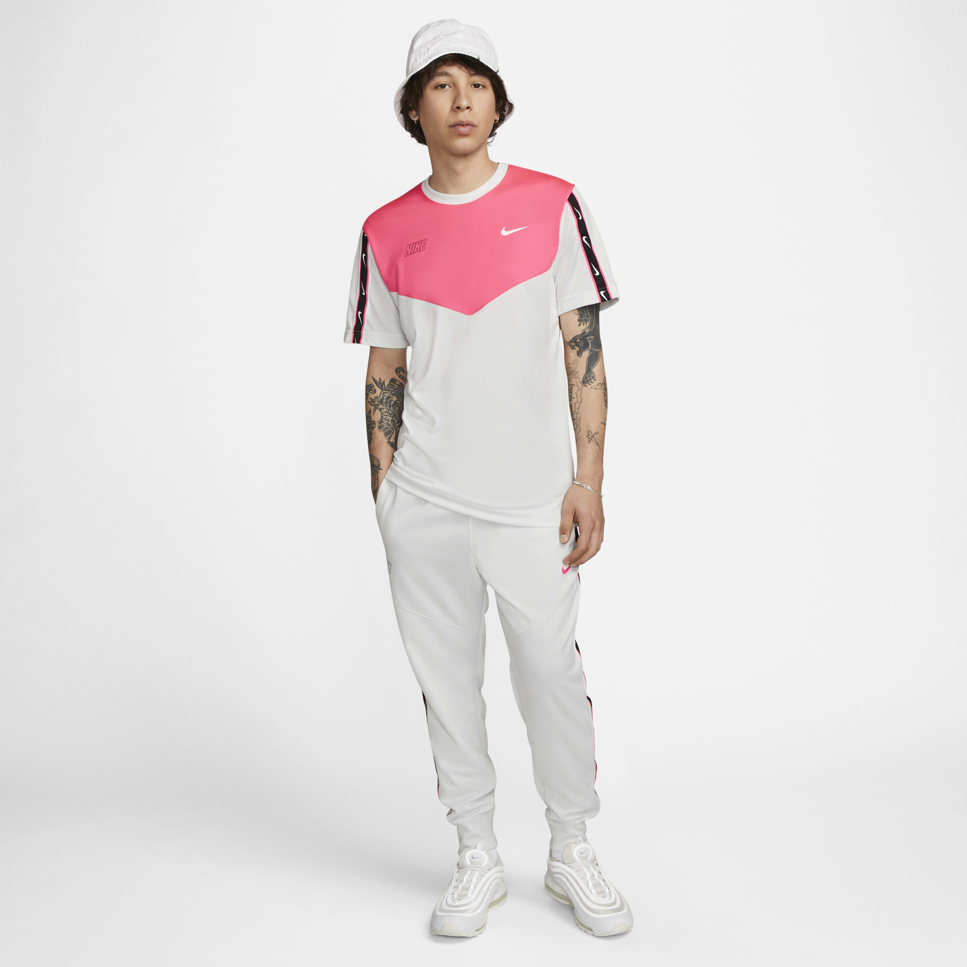 Nike repeat tracksuit bottoms hot sale