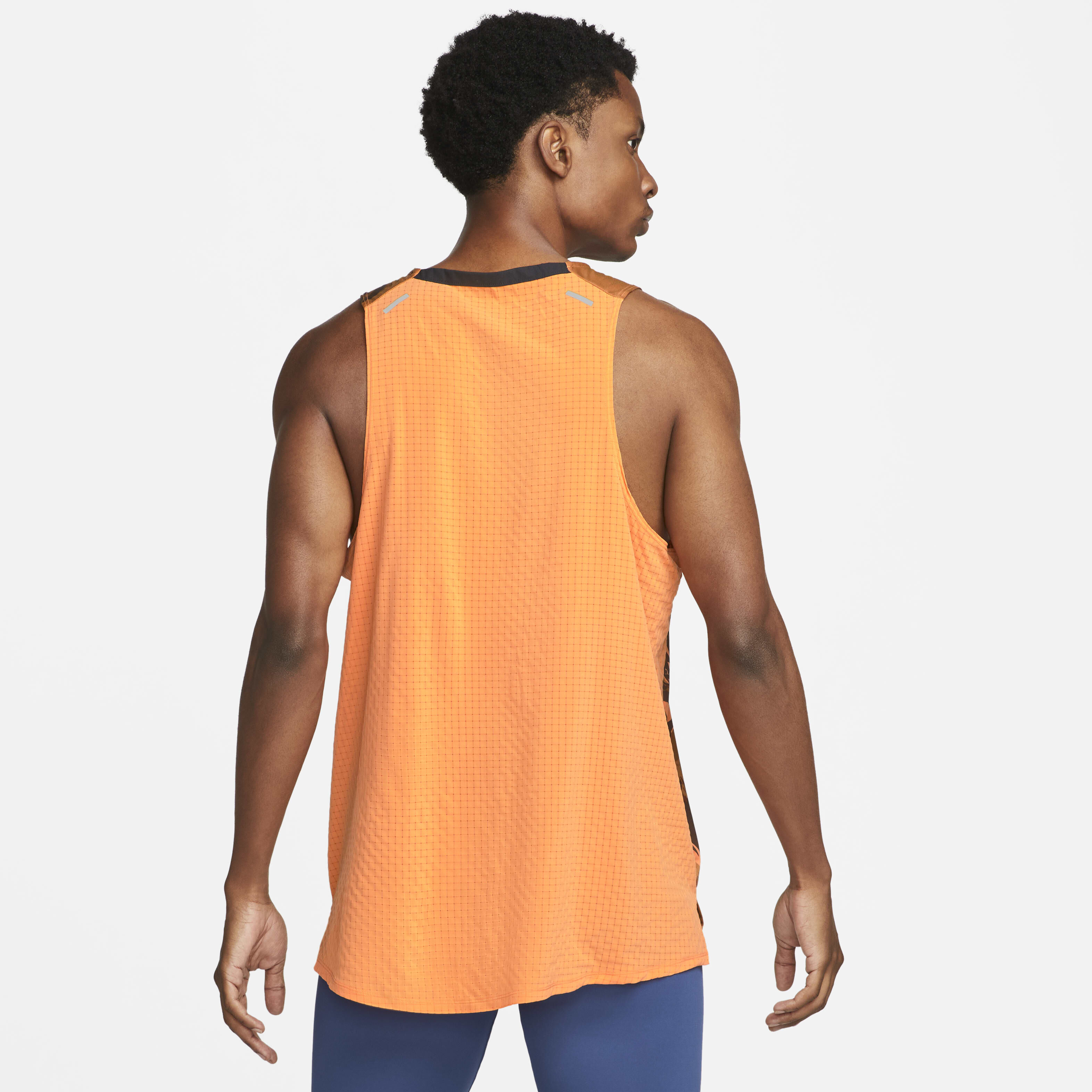 Buy Nike Dri FIT Trail Rise 365 Men s Running Tank Orange Trance Coconut Milk Nike Saudi Official