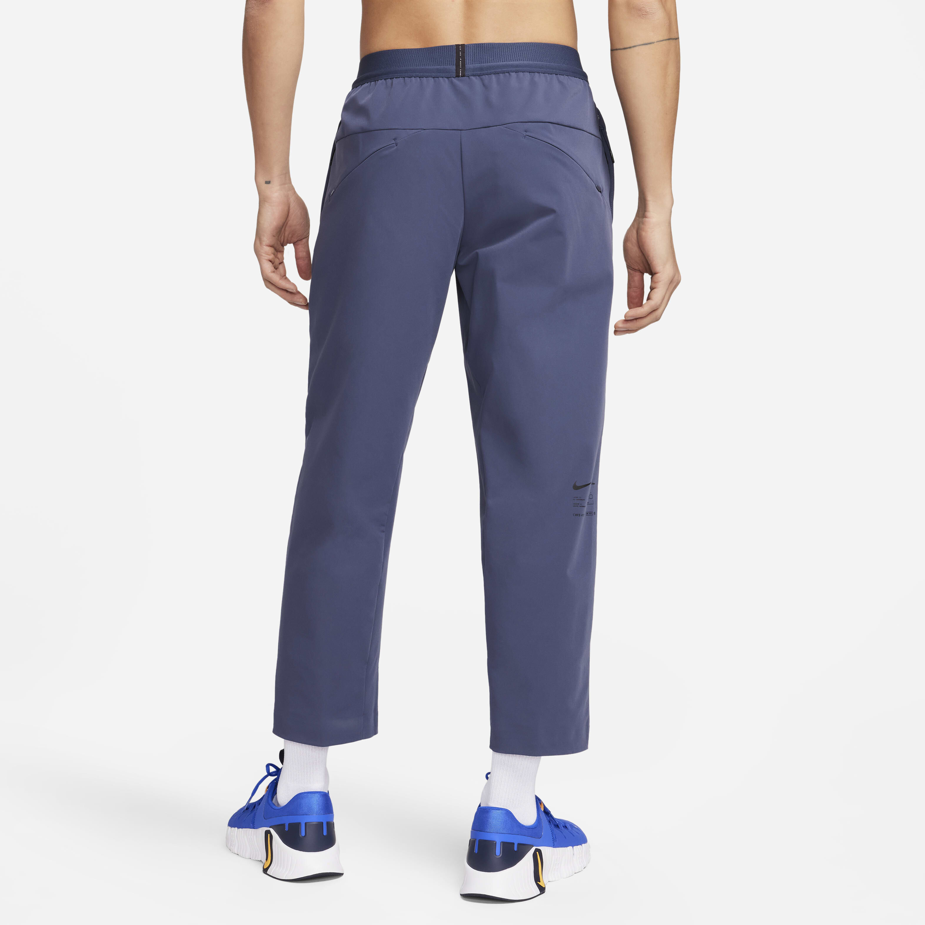 Buy Nike APS Men s Dri FIT Woven Versatile Trousers Thunder Blue Black Nike Saudi Official
