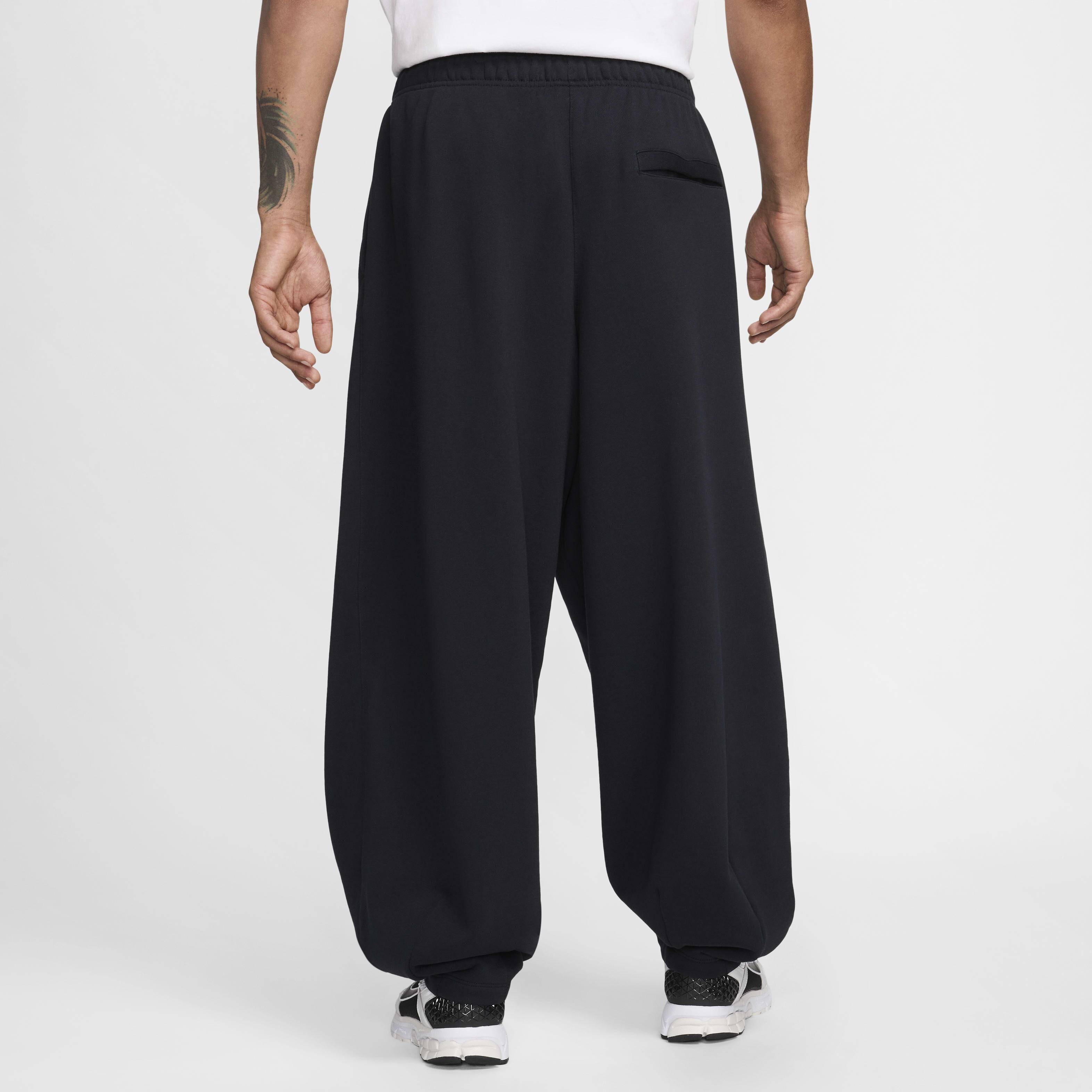 Buy Nike Club Fleece Men s Oversized French Terry Trousers Nike Saudi Official