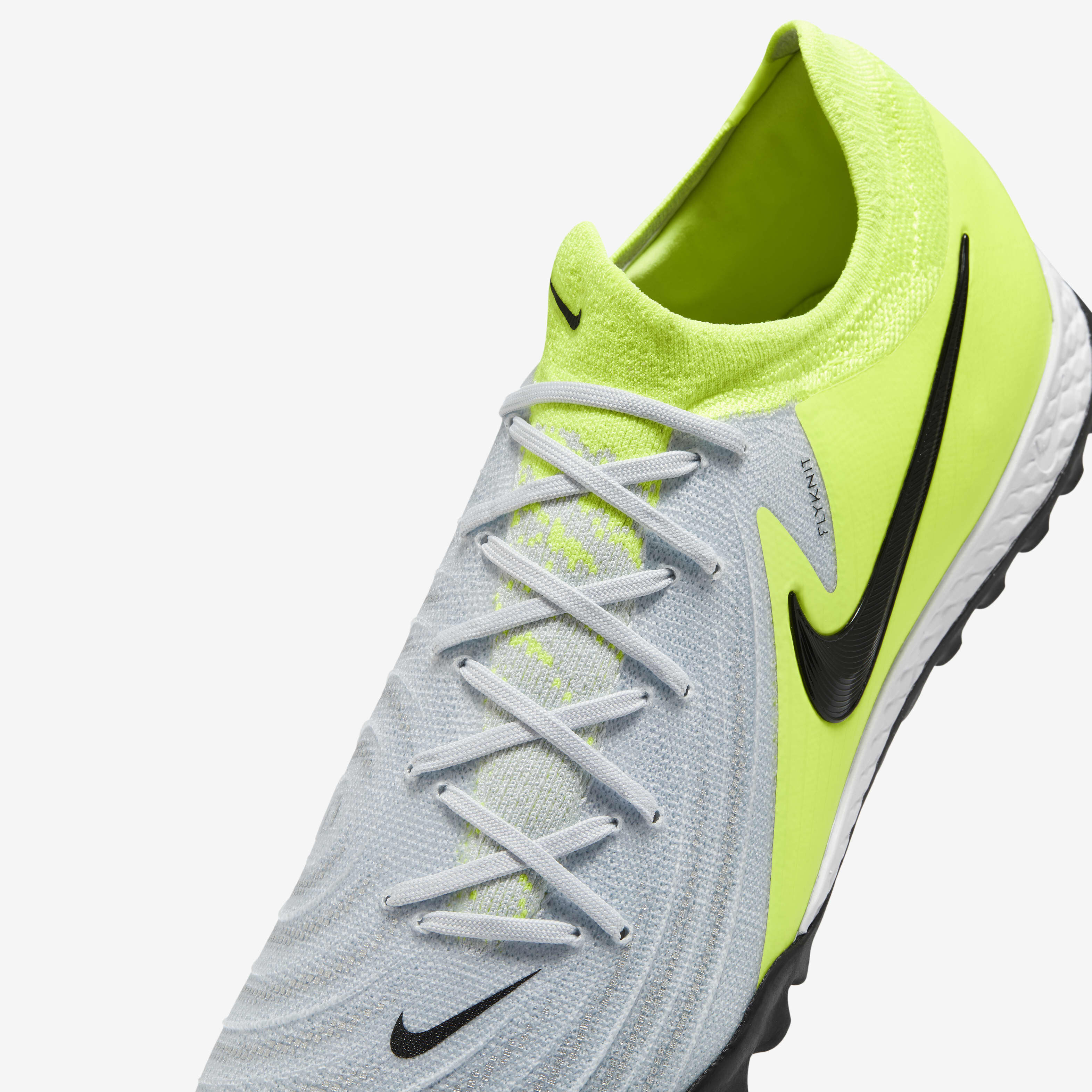Buy Nike Phantom GX 2 Pro TF Low-Top Football Shoes - Metallic  Silver/Volt/Black | Nike Saudi Official