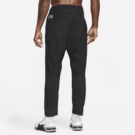 Shop Dri FIT ADV A.P.S. Men s Woven Fitness Trousers Nike KSA