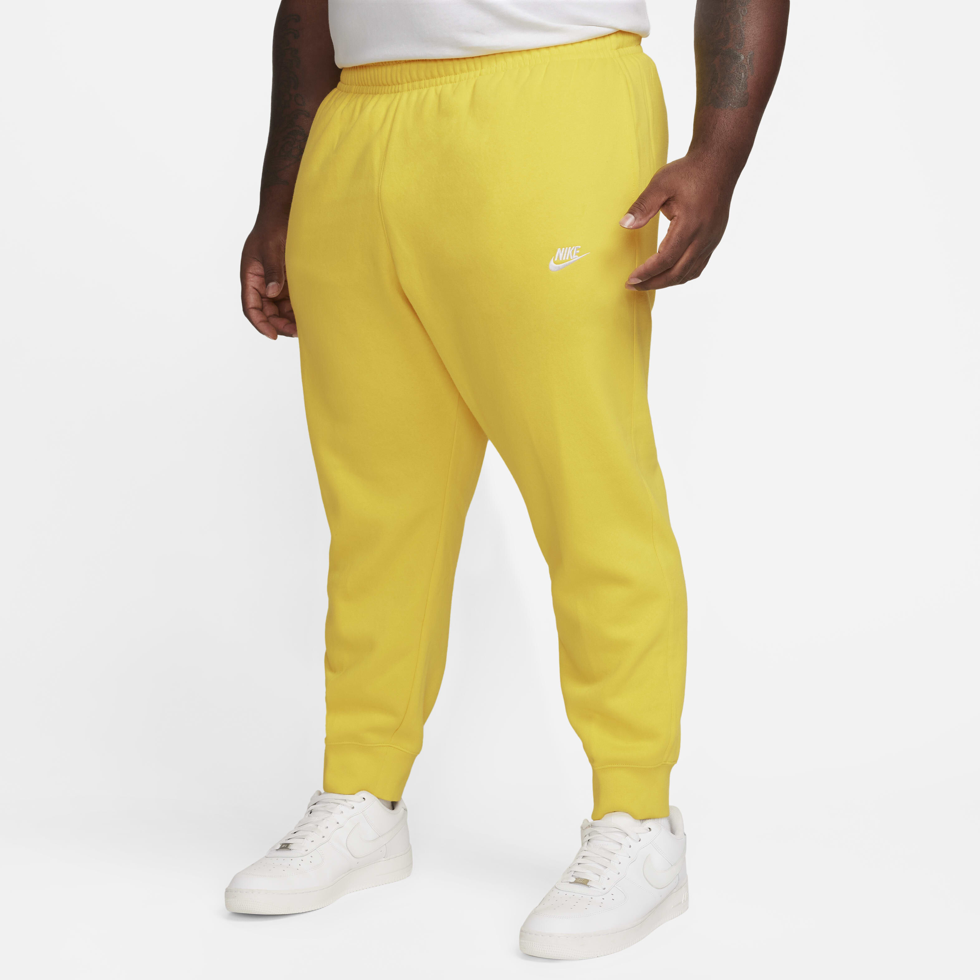 Nike joggers yellow hot sale