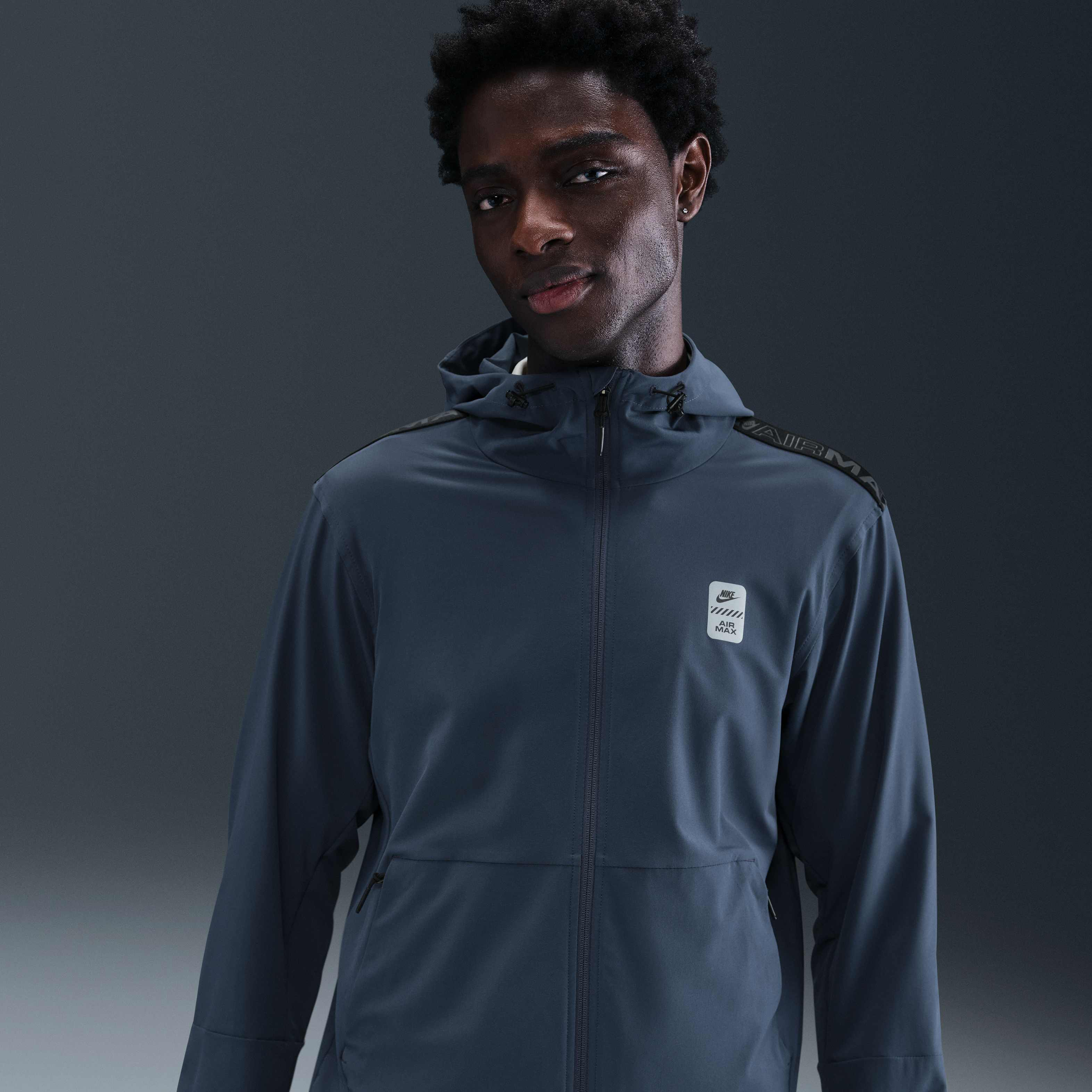 nike air woven jacket blue