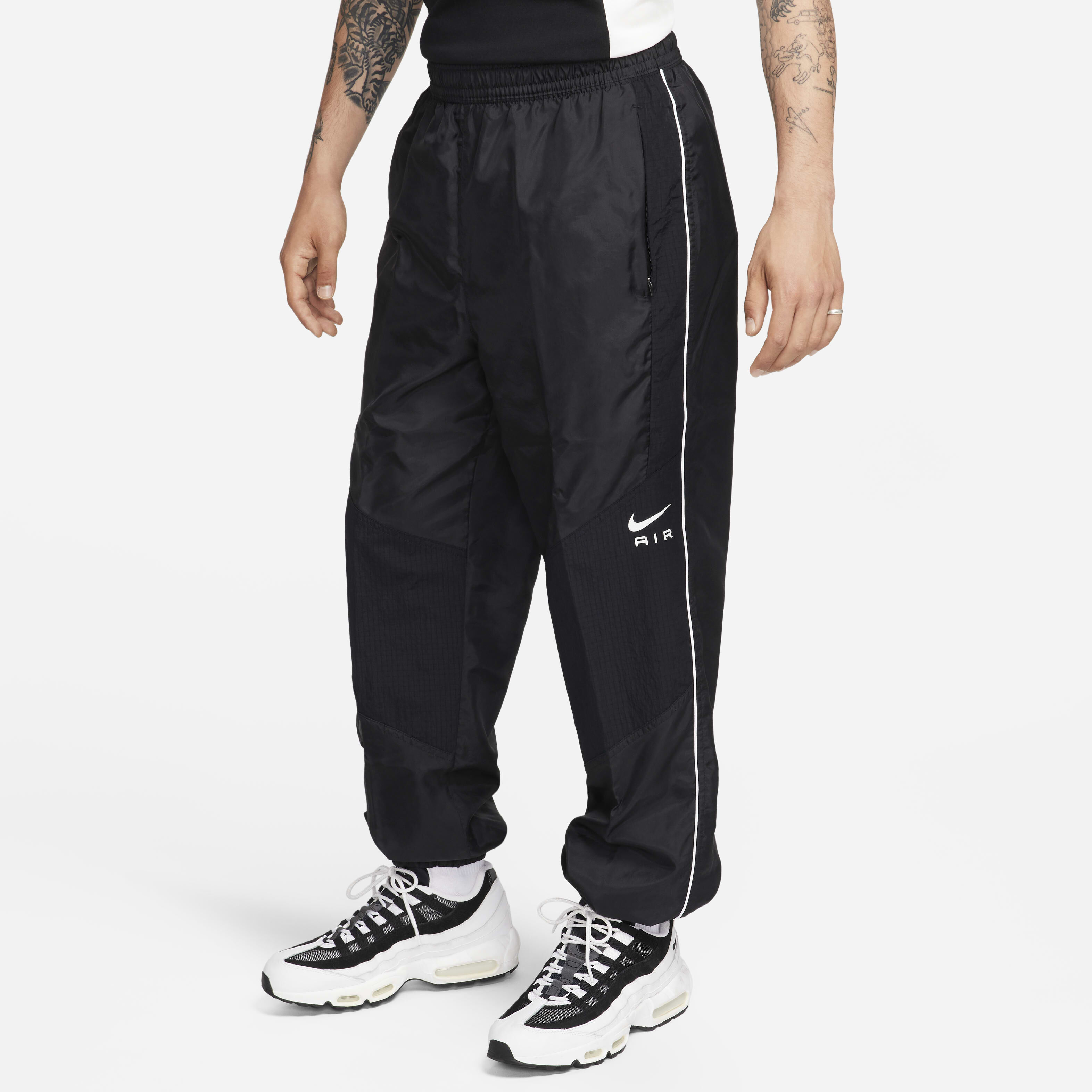 Buy Nike Air Men s Woven Trousers Nike Saudi Official