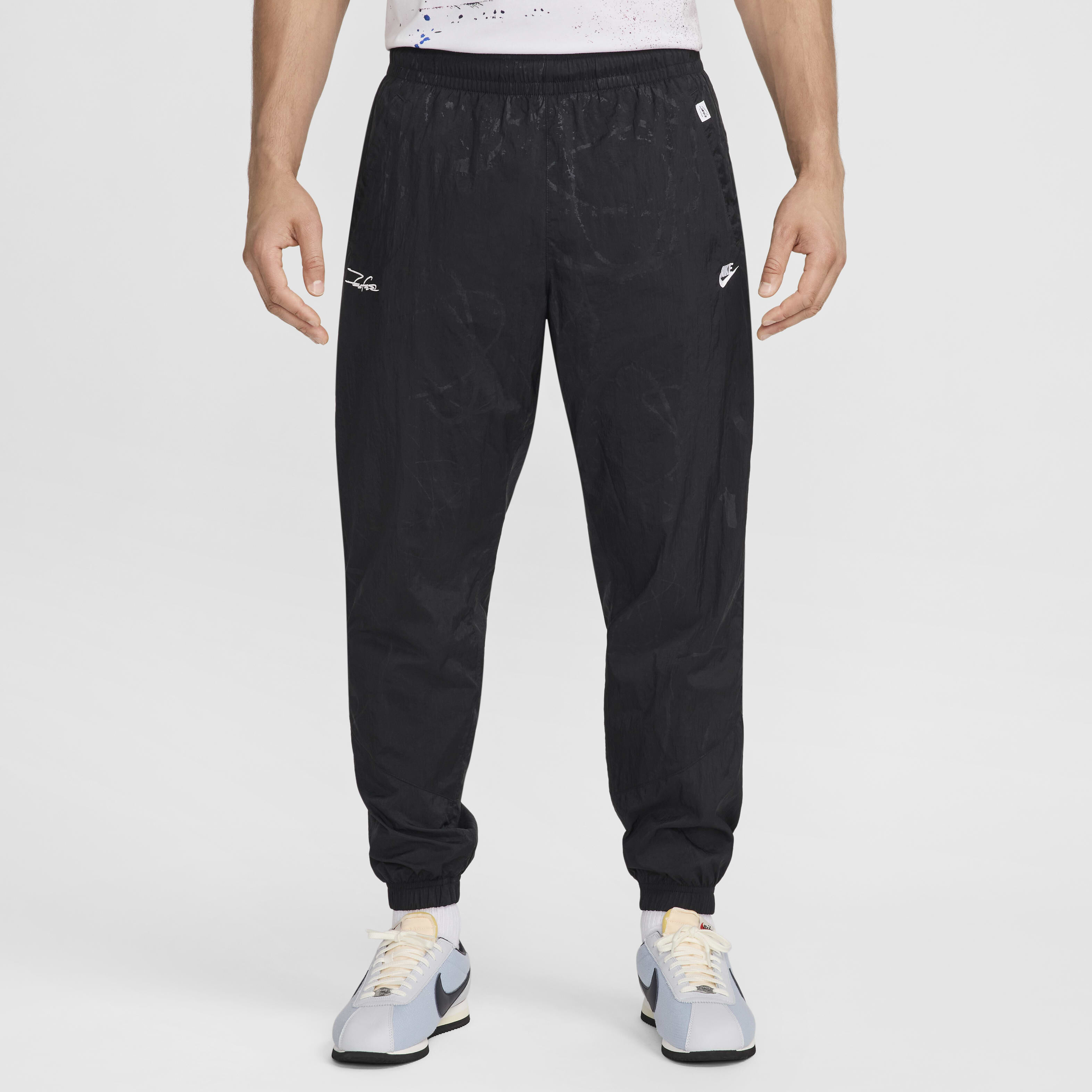 Buy Nike Sportswear Men s Breaking Lined Windrunner Trousers Nike Saudi Official