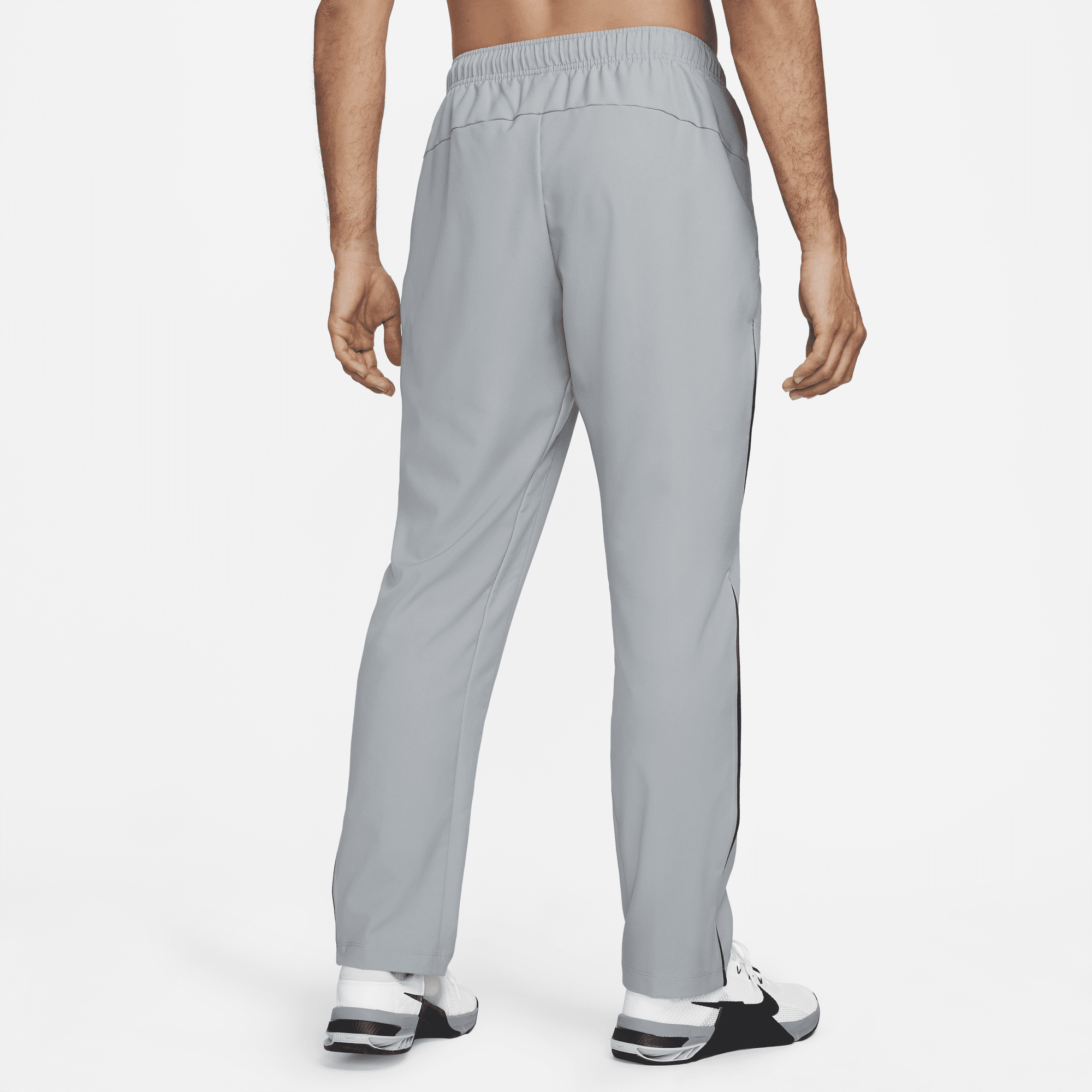 Shop Dri FIT Men s Woven Team Training Trousers Nike KSA
