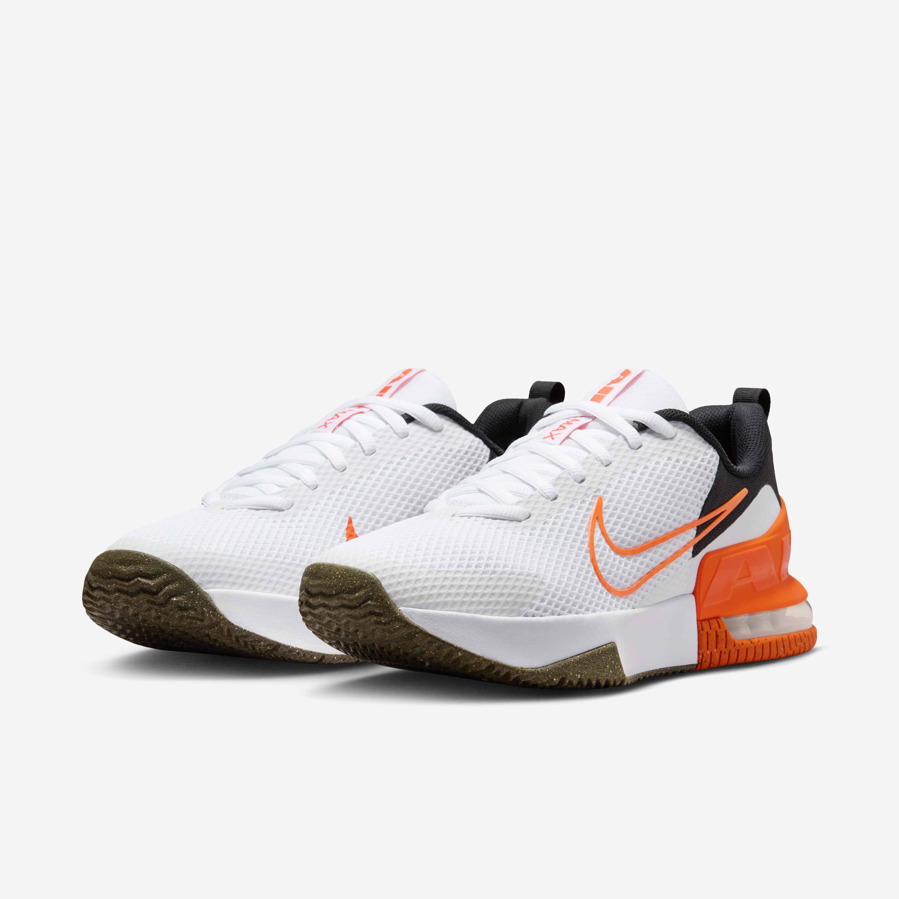 white nike shoes with orange stripe