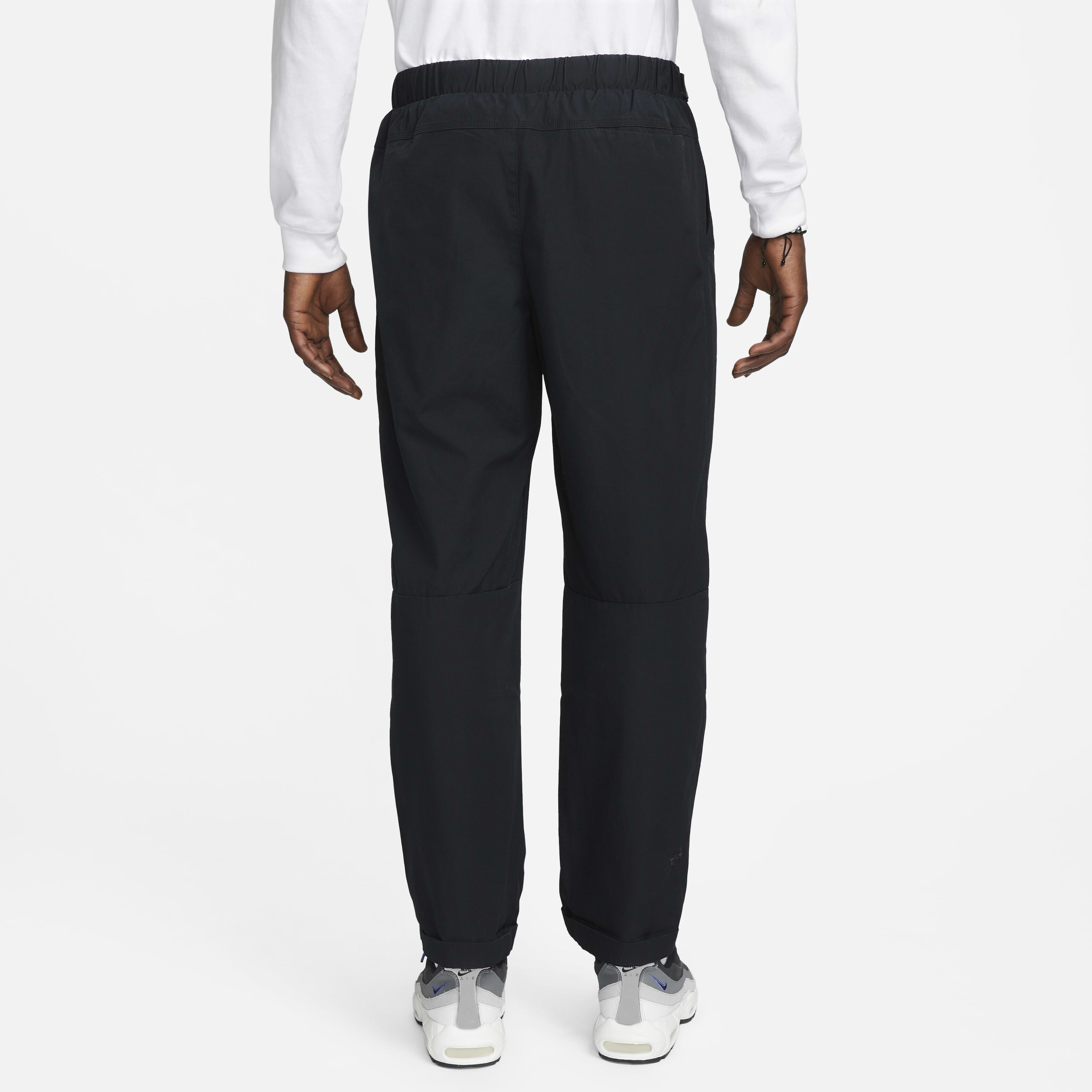 Buy Nike Sportswear Tech Pack Men s UPF Woven Trousers Black Black Black Black Nike Saudi Official