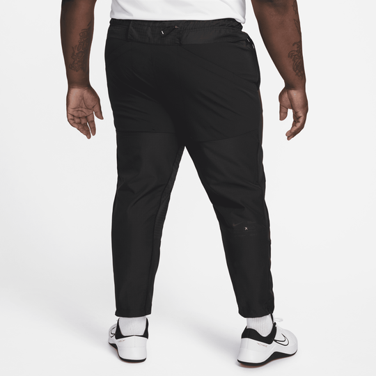 Shop APS Men's Dri-FIT ADV Woven Versatile Trousers | Nike KSA