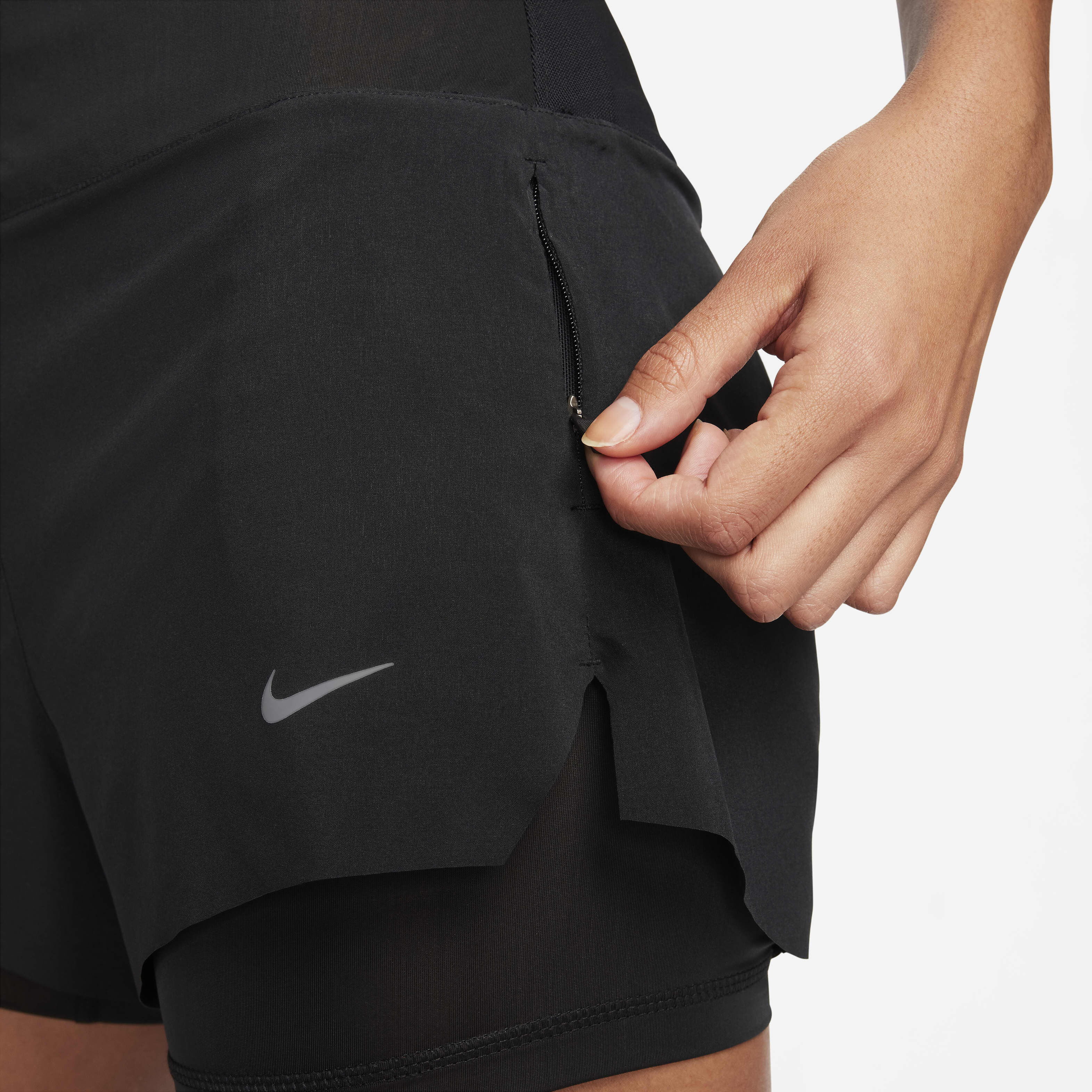 Buy Nike Dri FIT Swift Women s Mid Rise 8cm approx. 2 in 1 Running Shorts with Pockets Nike Saudi Official