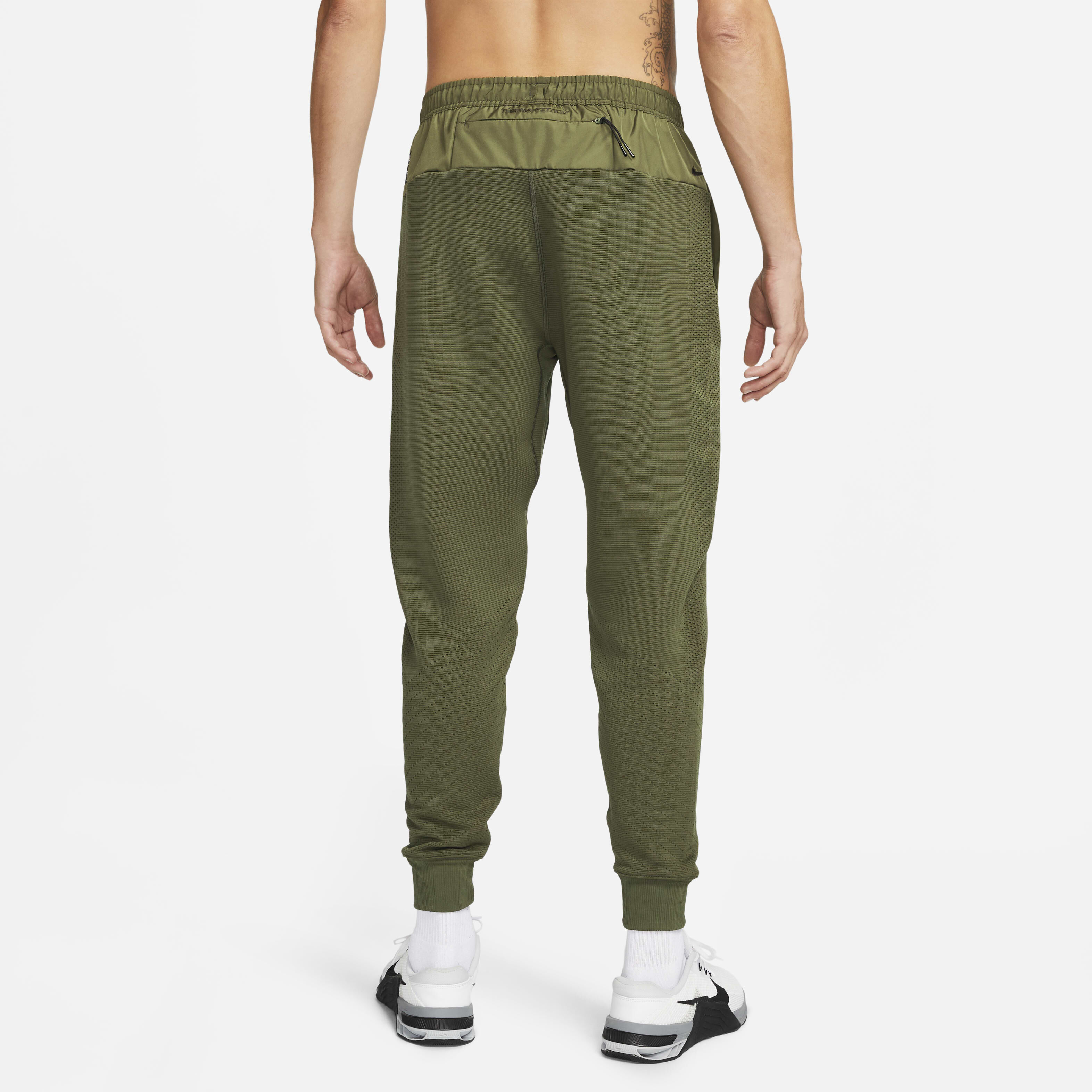 Buy Nike Therma FIT ADV A.P.S. Men s Fleece Fitness Trousers Rough Green Black Nike Saudi Official