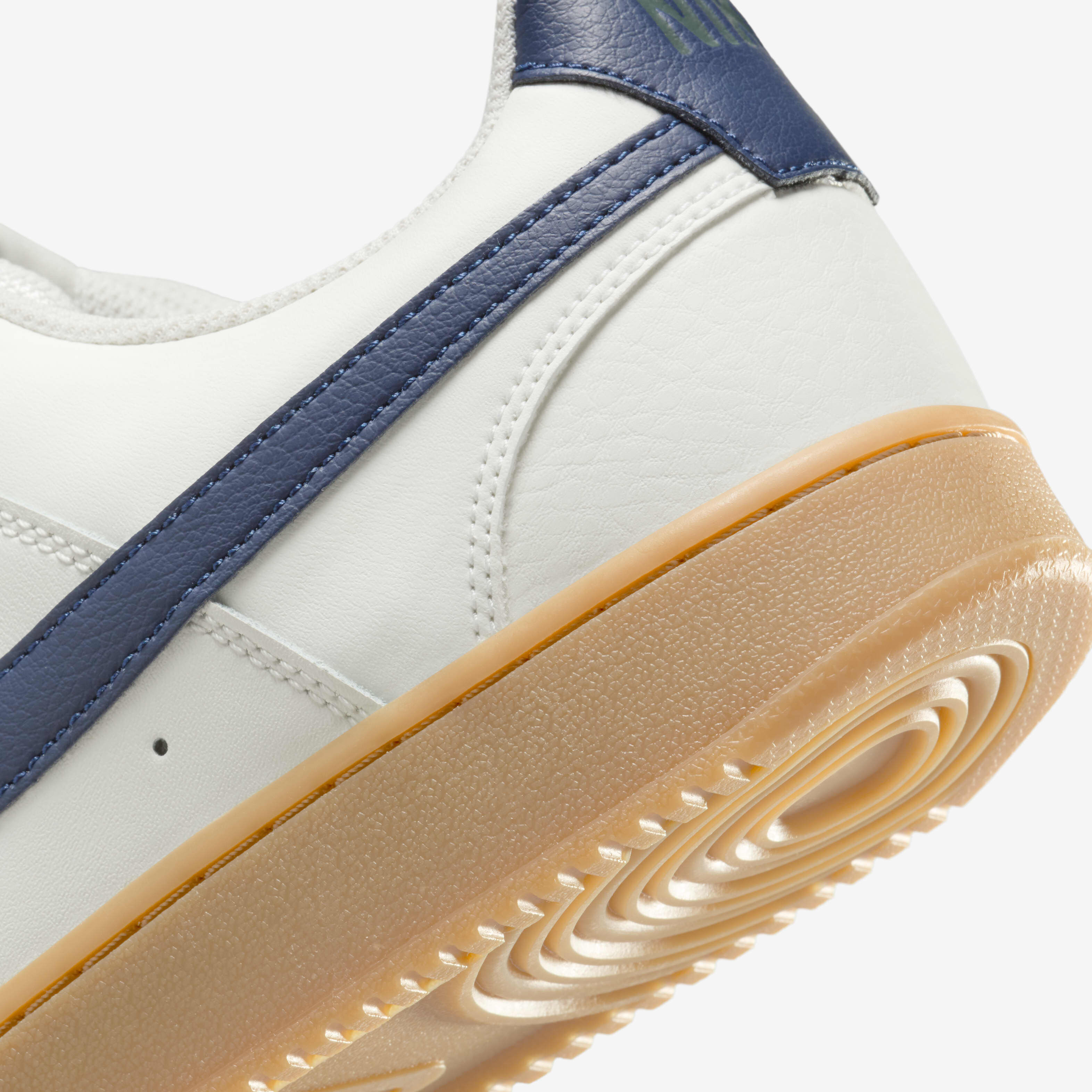 nike air force 1 trainers with navy swoosh and gum sole