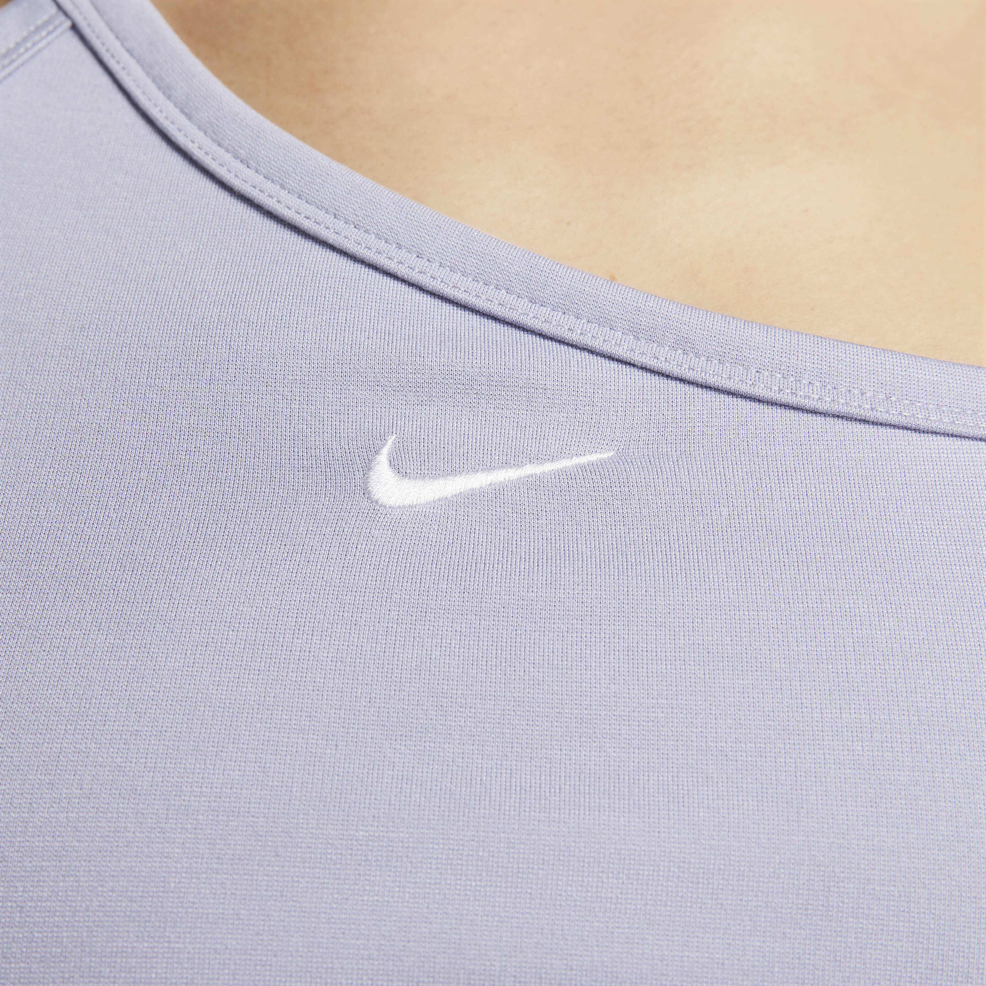 Buy Nike Sportswear Everyday Modern Women s Asymmetrical Crop Tank Indigo Haze Oxygen Purple Nike Saudi Official
